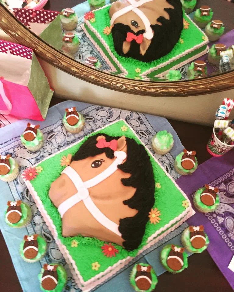 Realistic sculpted horse head cake for equestrian celebration