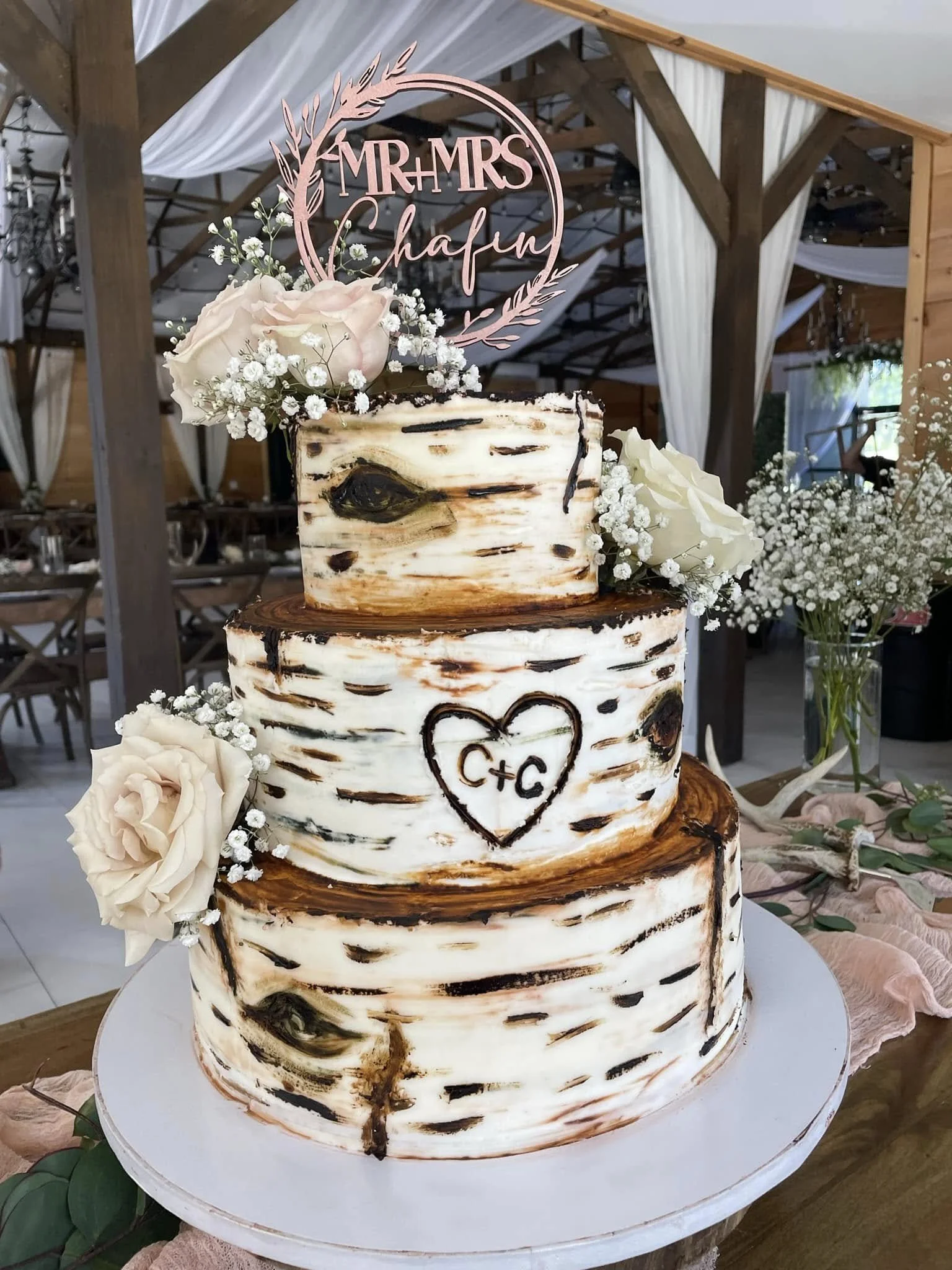 Rustic birch stump wedding cake with carved initials in Dawsonville, Georgia