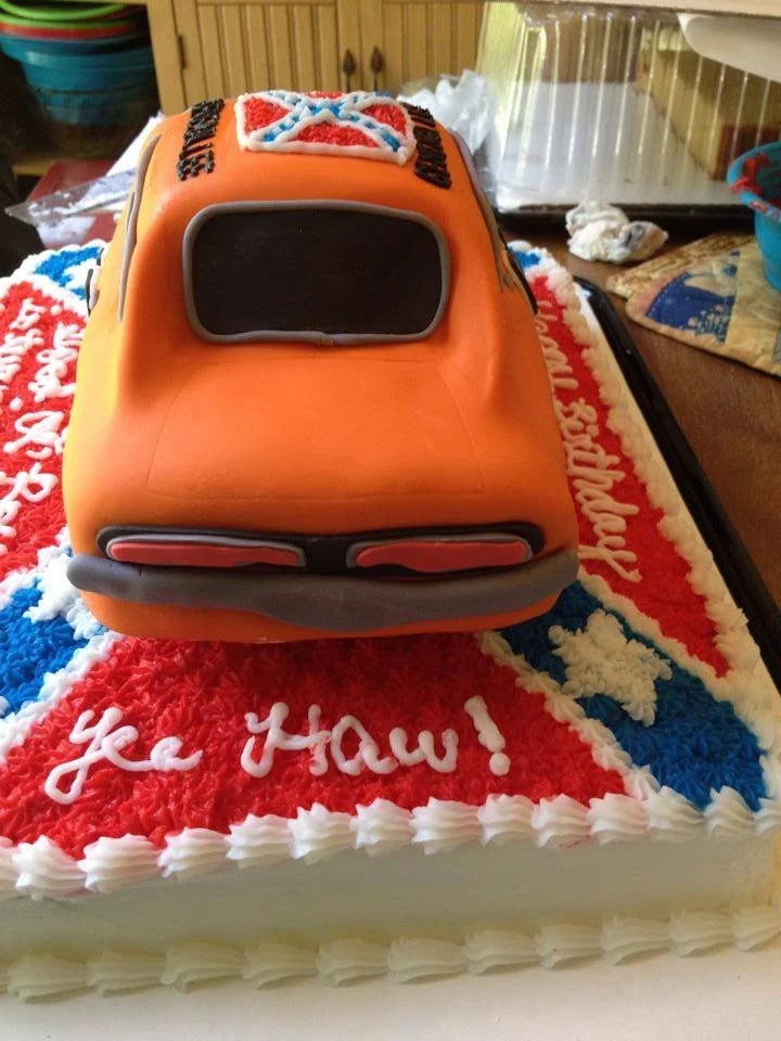 Sculpted orange muscle car cake inspired by classic television show vehicle