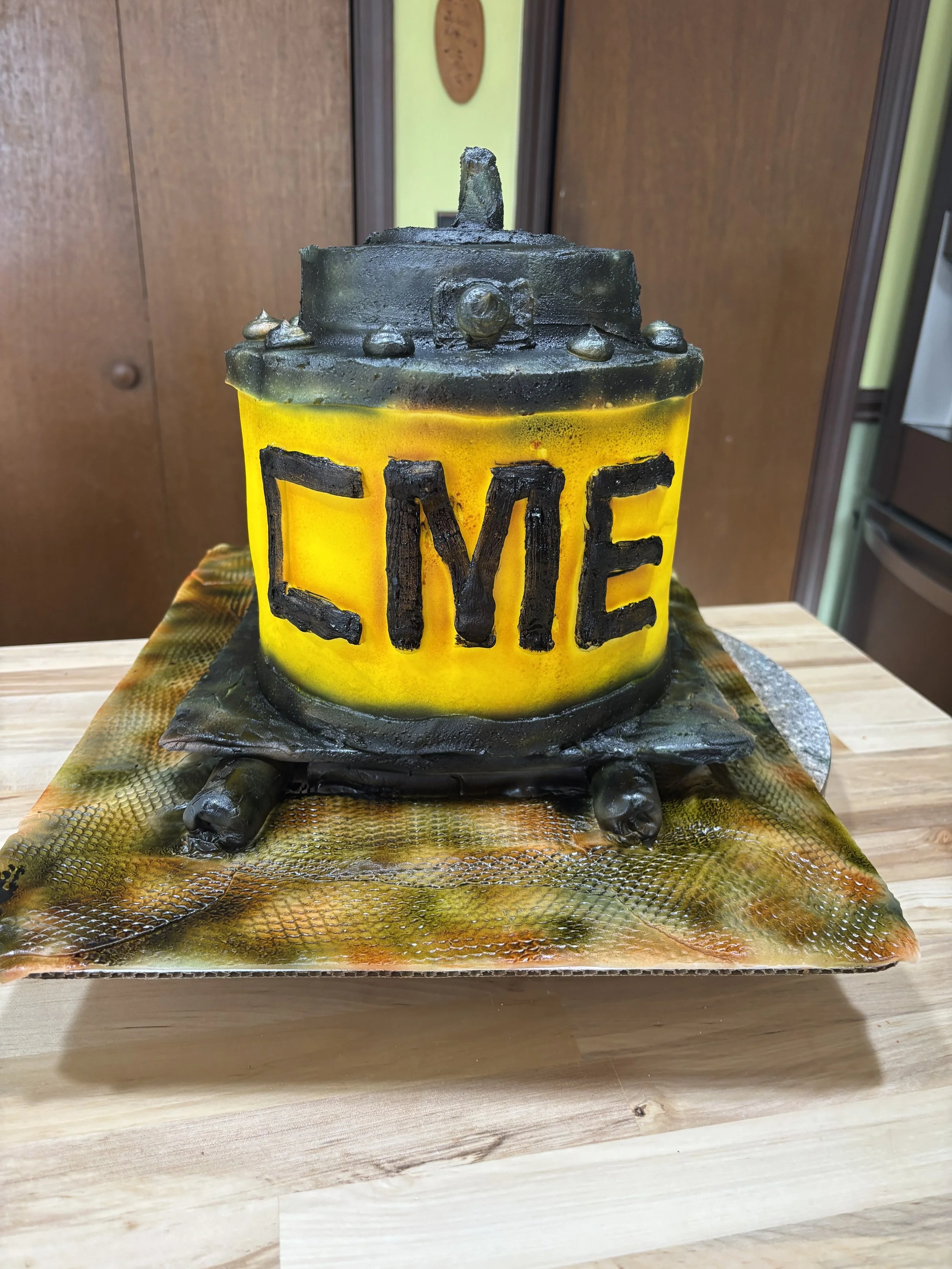 Industrial gearbox cake designed for a mechanical engineering or drilling company celebration.