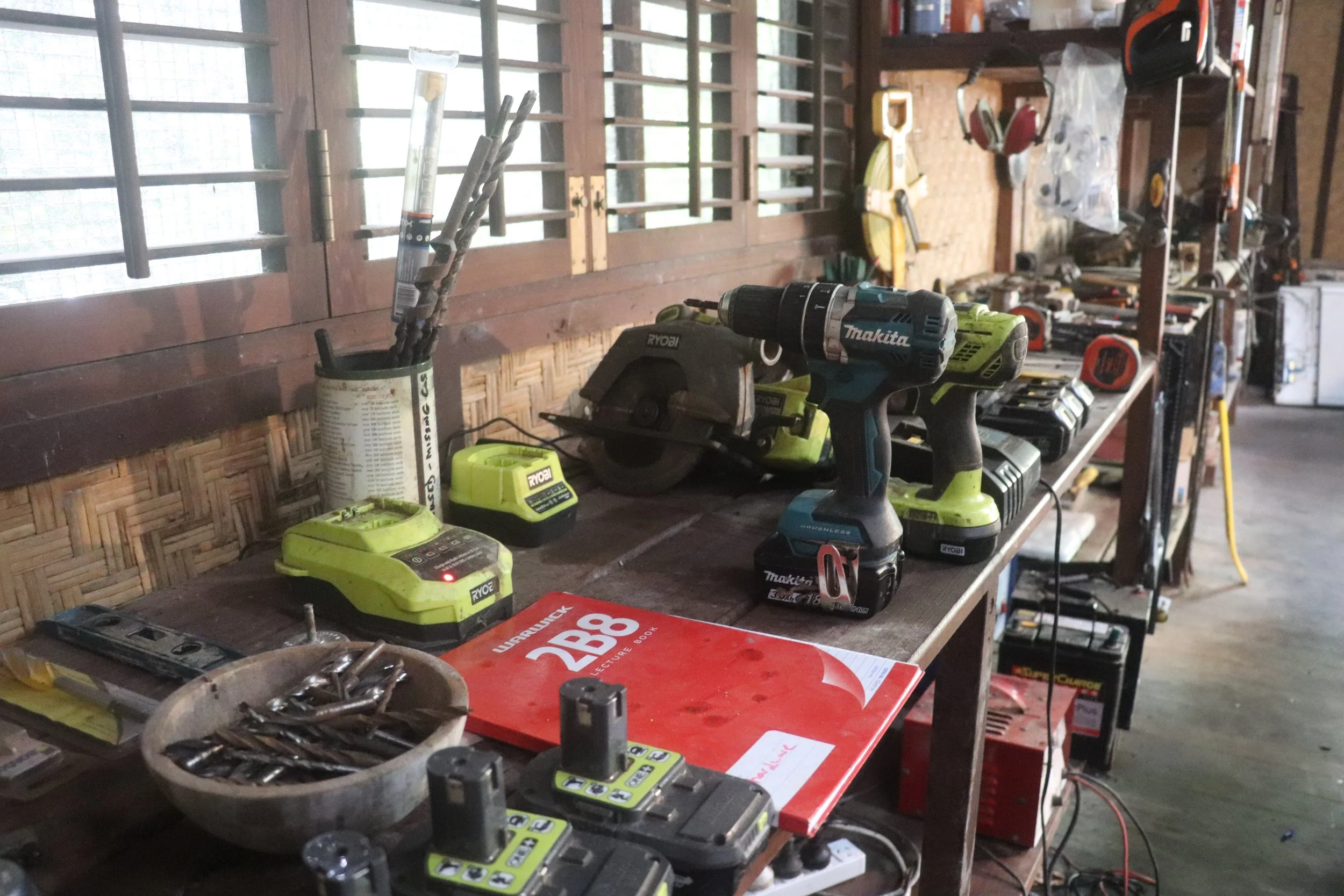 power tools in off grid workshop of ecovillage