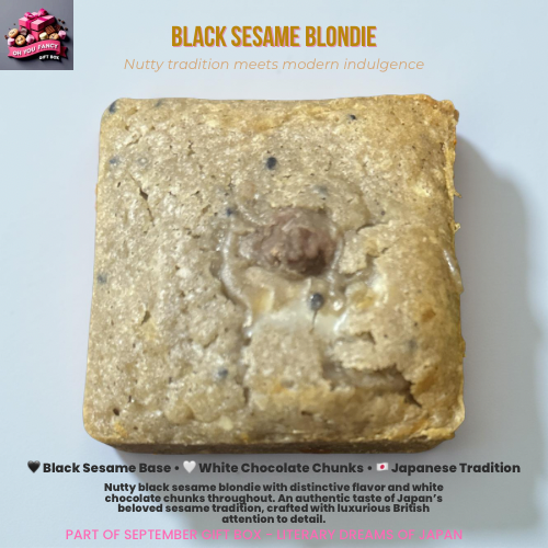 Black sesame blondie with nutty beige colour showing white chocolate chunks throughout, representing authentic Japanese sesame tradition