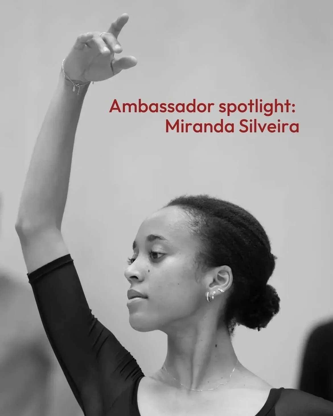 Black and white photo of Miranda Silveira with her eyes closed, raising her right hand with fingers in a delicate gesture. Red text on the image reads 'Ambassador spotlight: Miranda Silveira.'