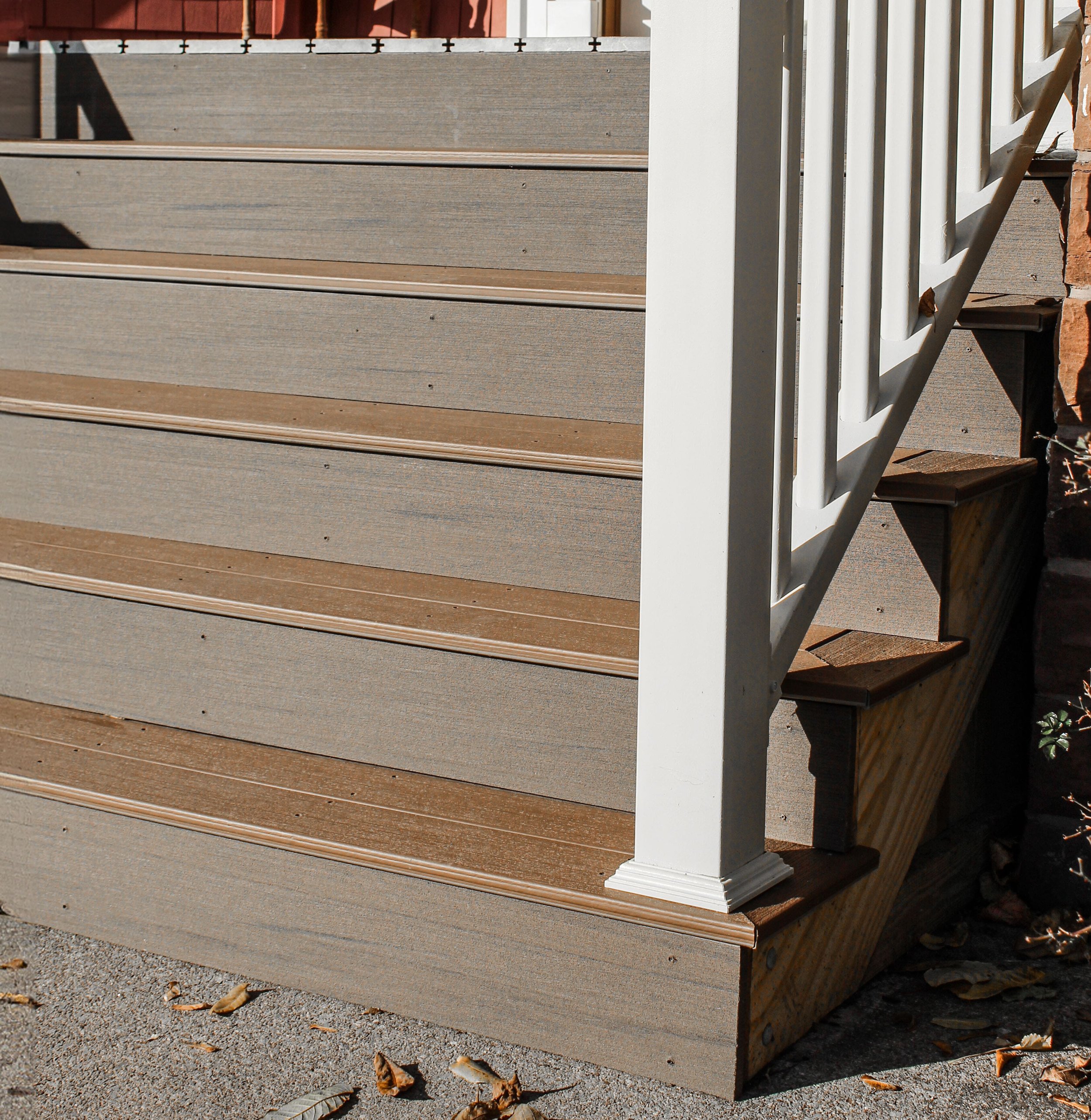 Exterior wooden staircase built with weather-resistant materials by Empire Stairworks.