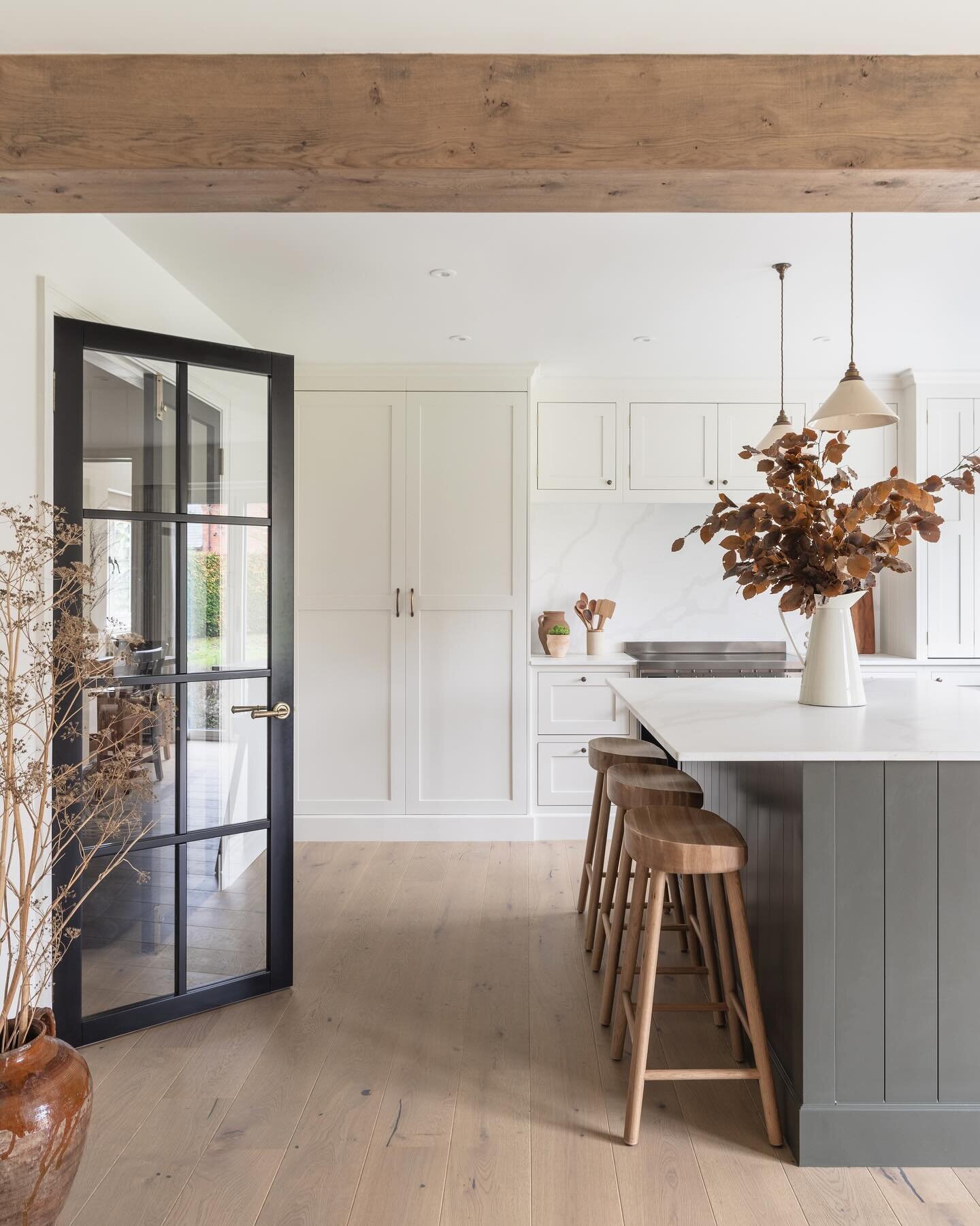 A favourite view of this recently installed kitchen nestled in the Shropshire countryside. Natural earthy tones paired with beautiful cabinetry by Christopher Johnson Kitchens makes for a classic and sophisticated space which will stand the test of t