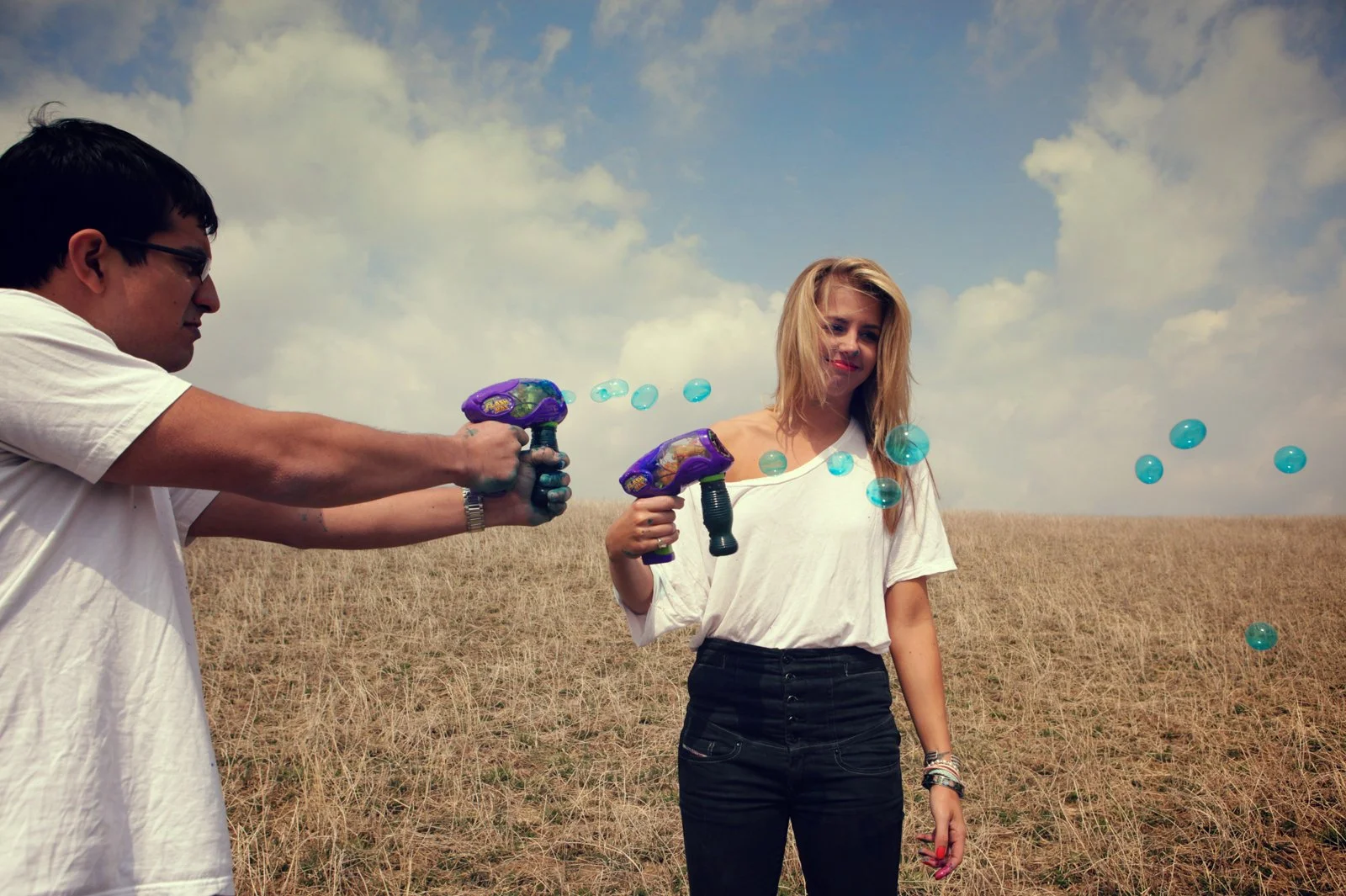 Engagement session with wedding photographer. Bubbles and fun.