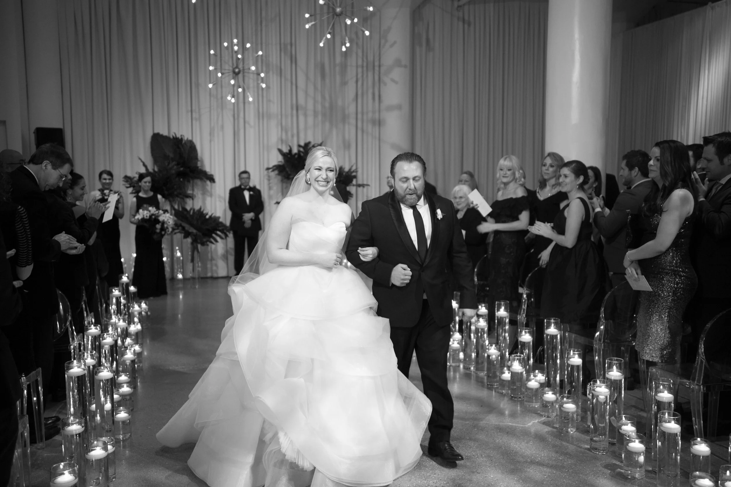 bride and groom get married kiss ceremony Venue six10 Chicago wedding photographer near me 