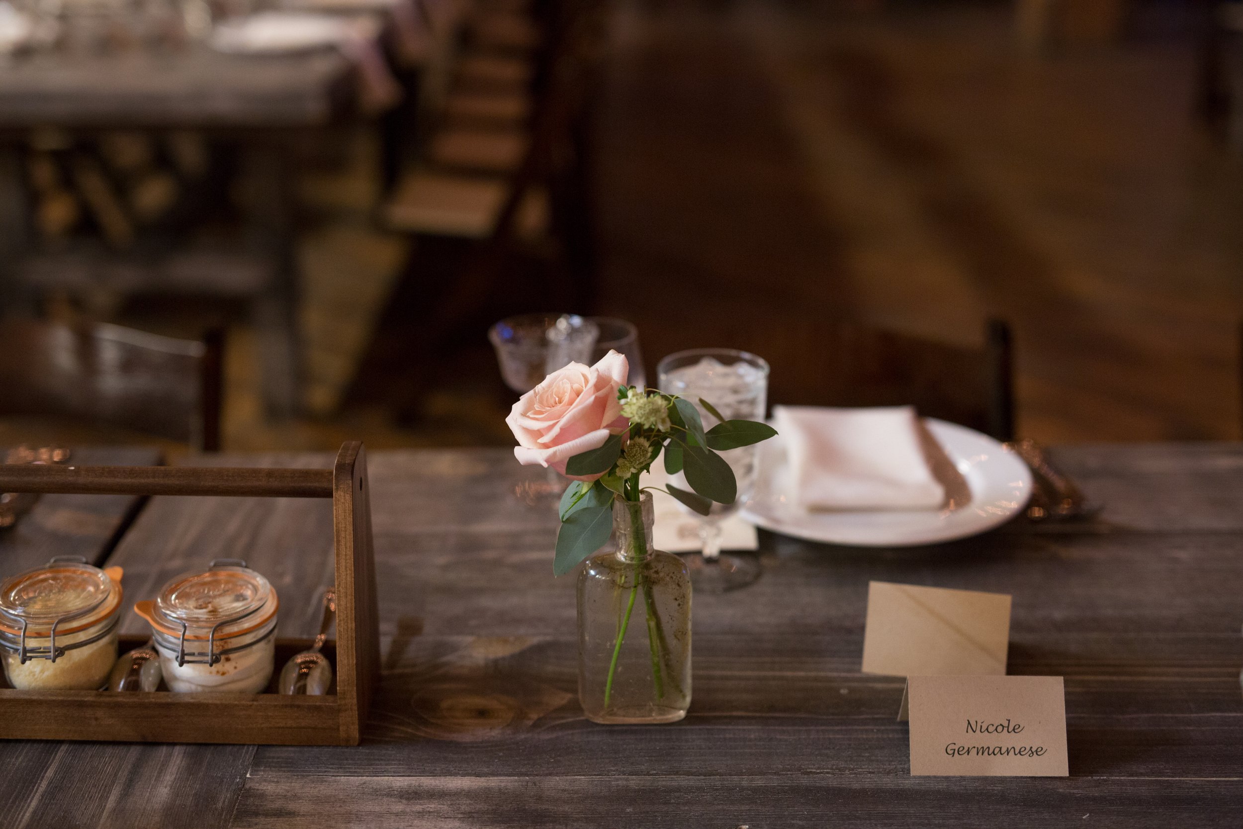wedding reception table centerpieces with flowers wedding photographer near me