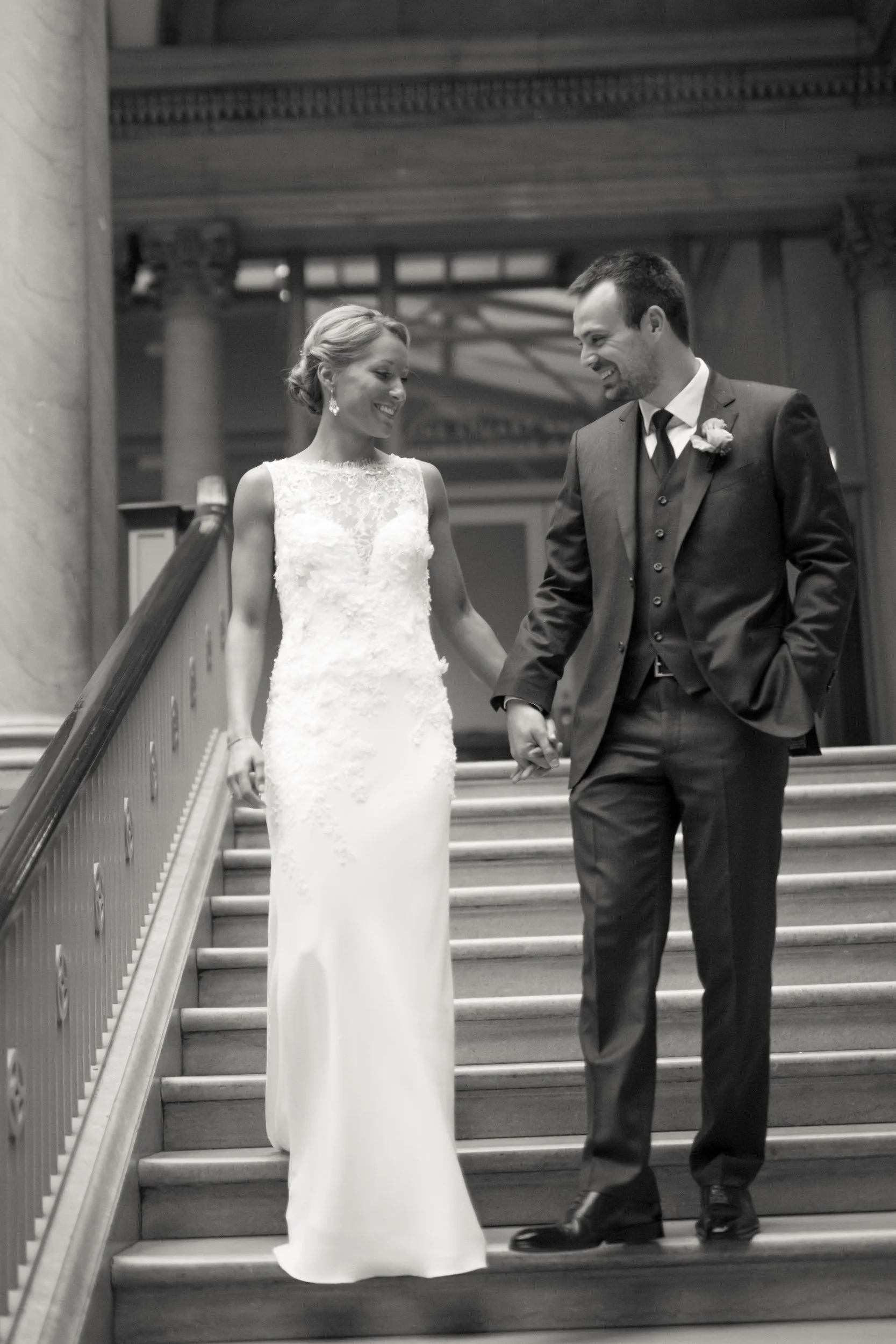 bride and groom at the Chicago Art Institute on stairs Chicago wedding photography