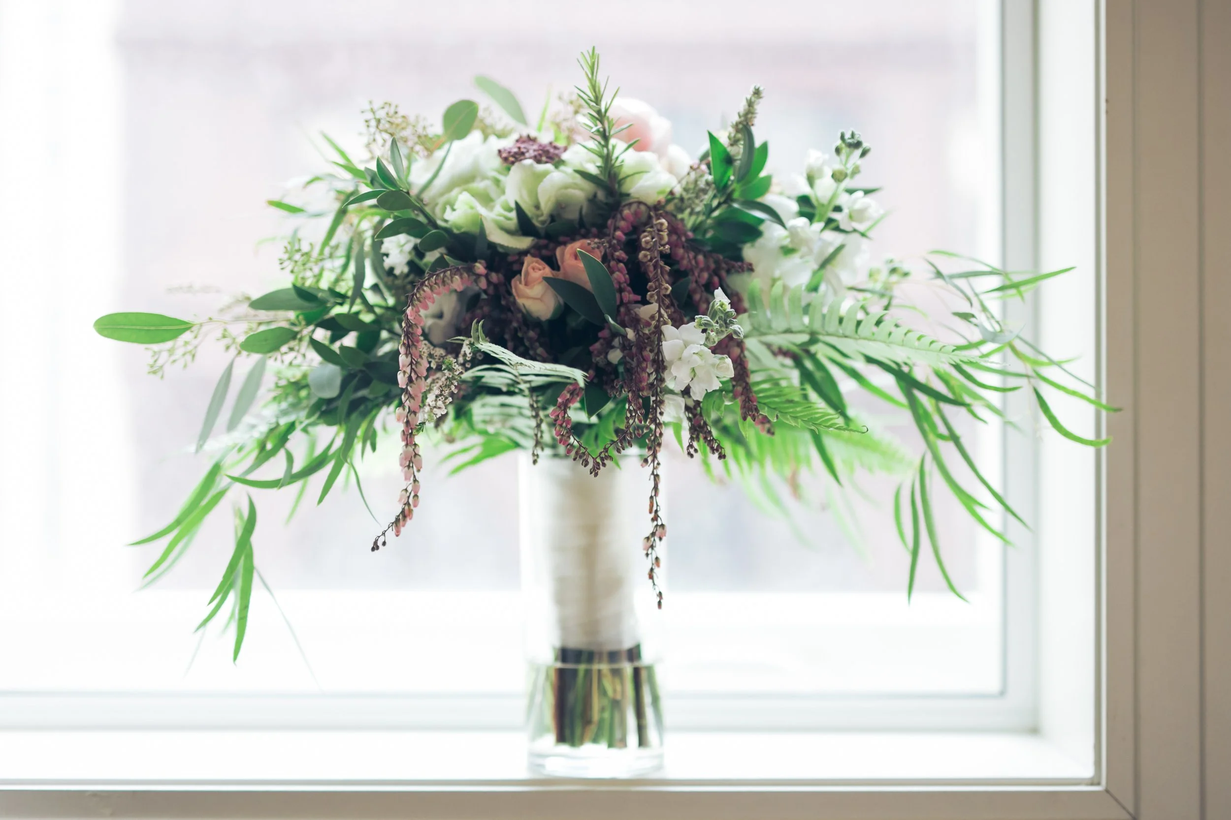 bridal flower bouquet window Chicago wedding photographer near me