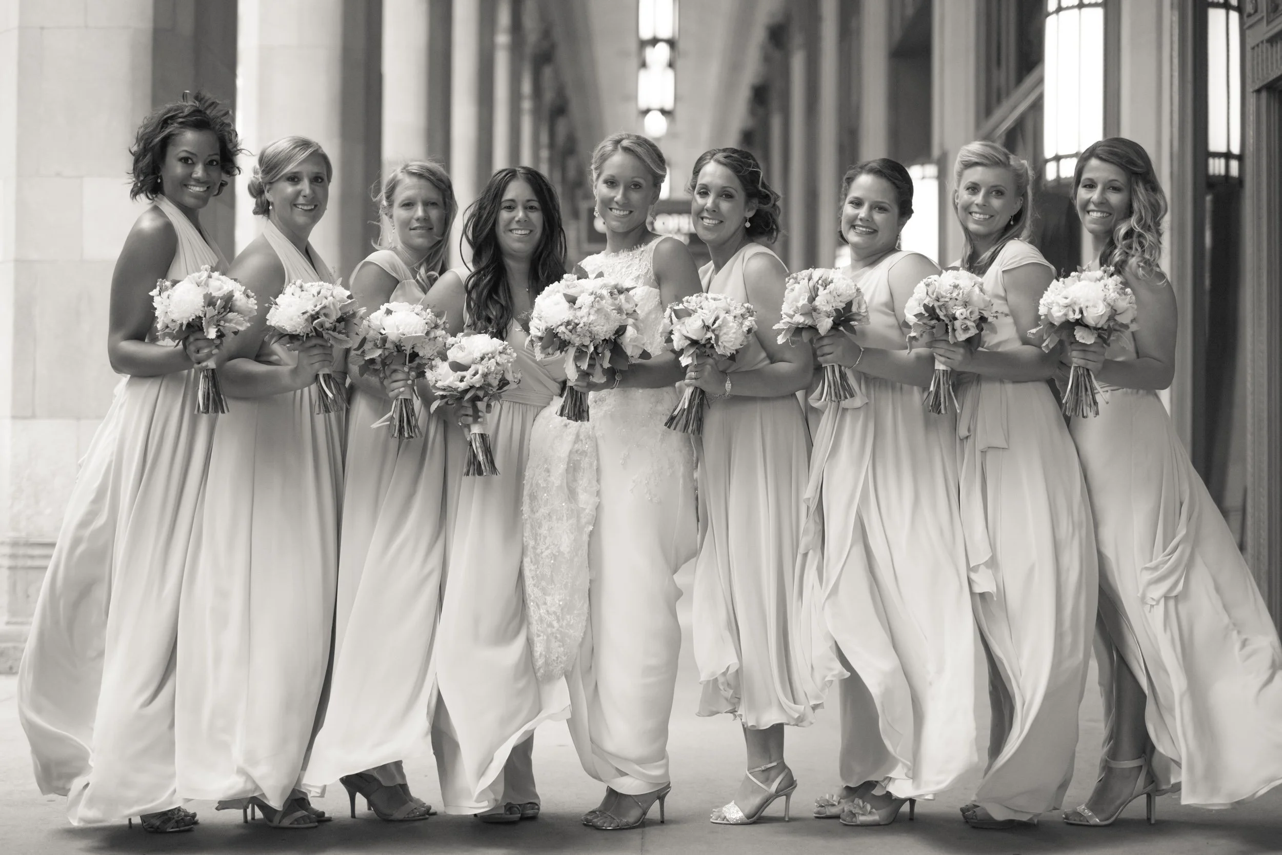 bride with her bridesmaids in the rain Lyric opera House Chicago wedding photography