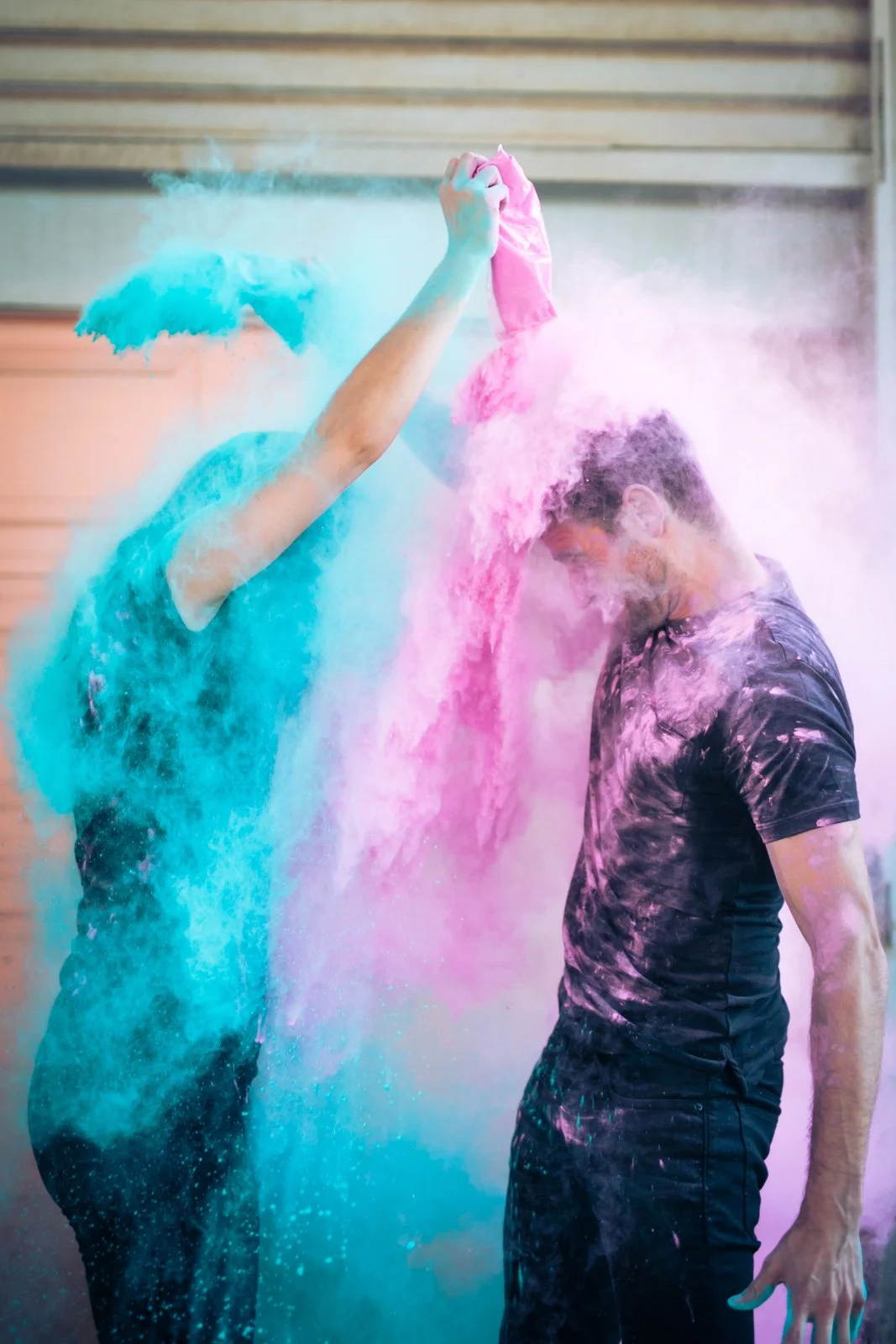 holi powder engagement photo session under el track Chicago wedding photography