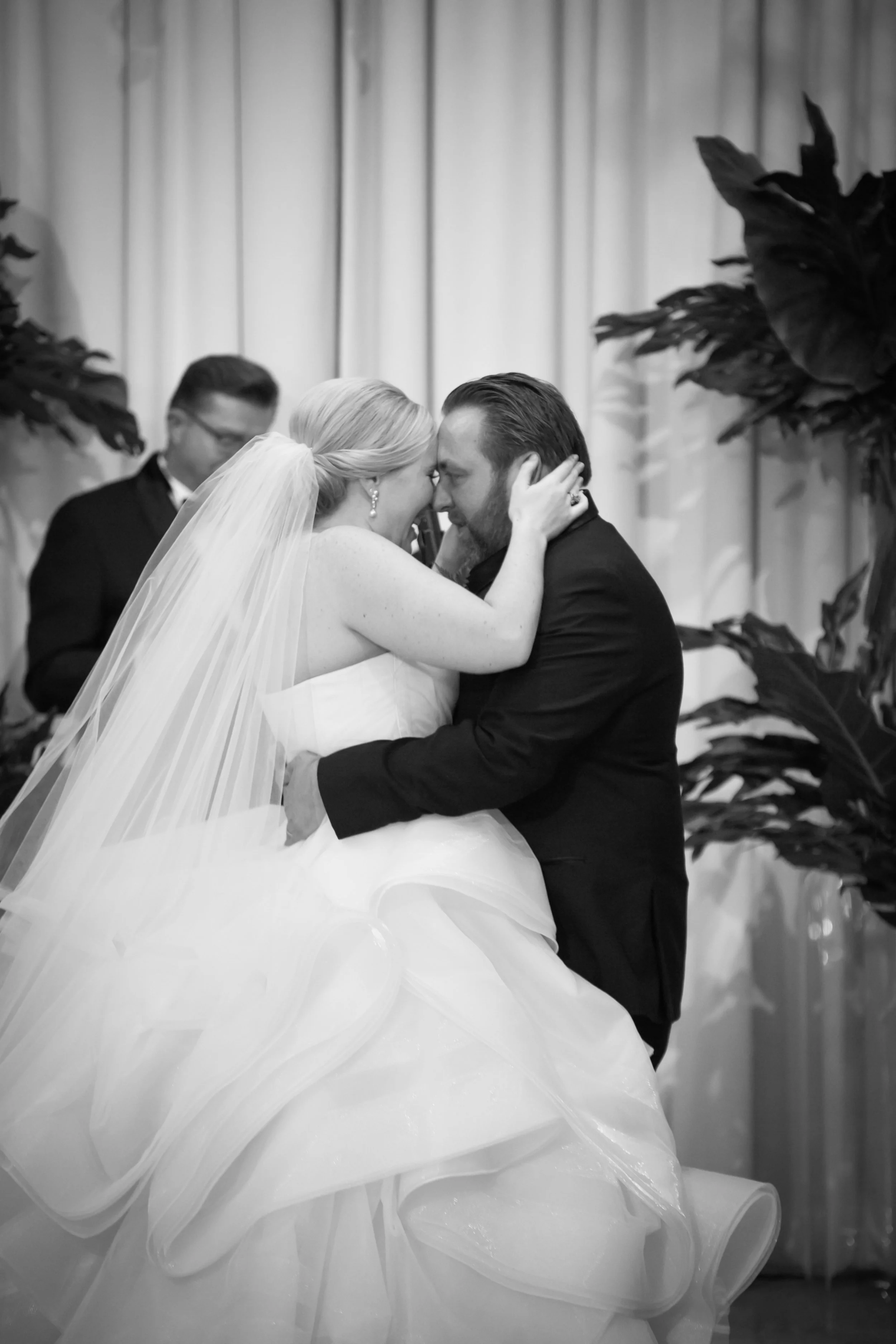 bride and groom get married kiss ceremony Venue six10 Chicago wedding photographer near me 