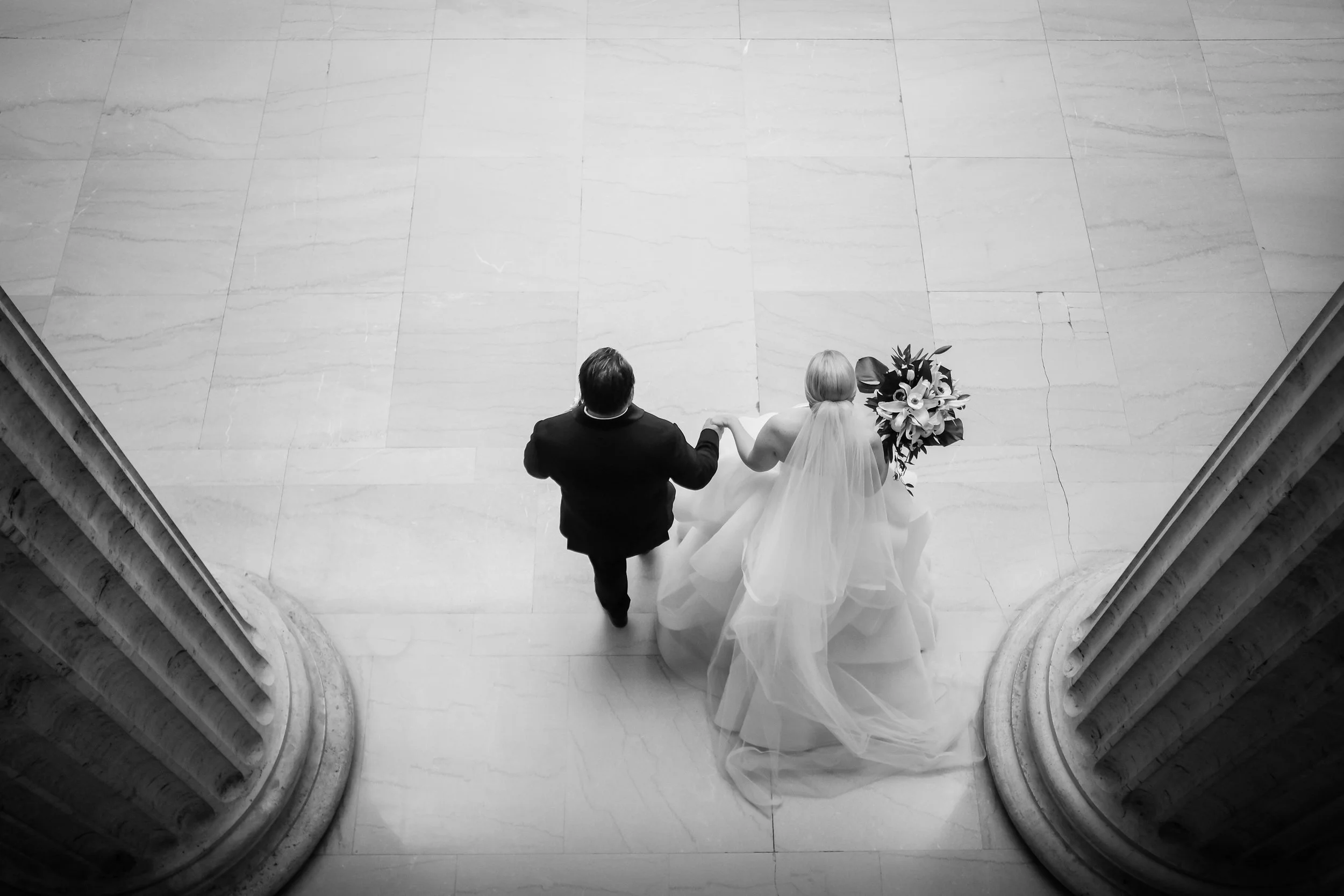 bride with groom Chicago downtown Union station wedding photography packages