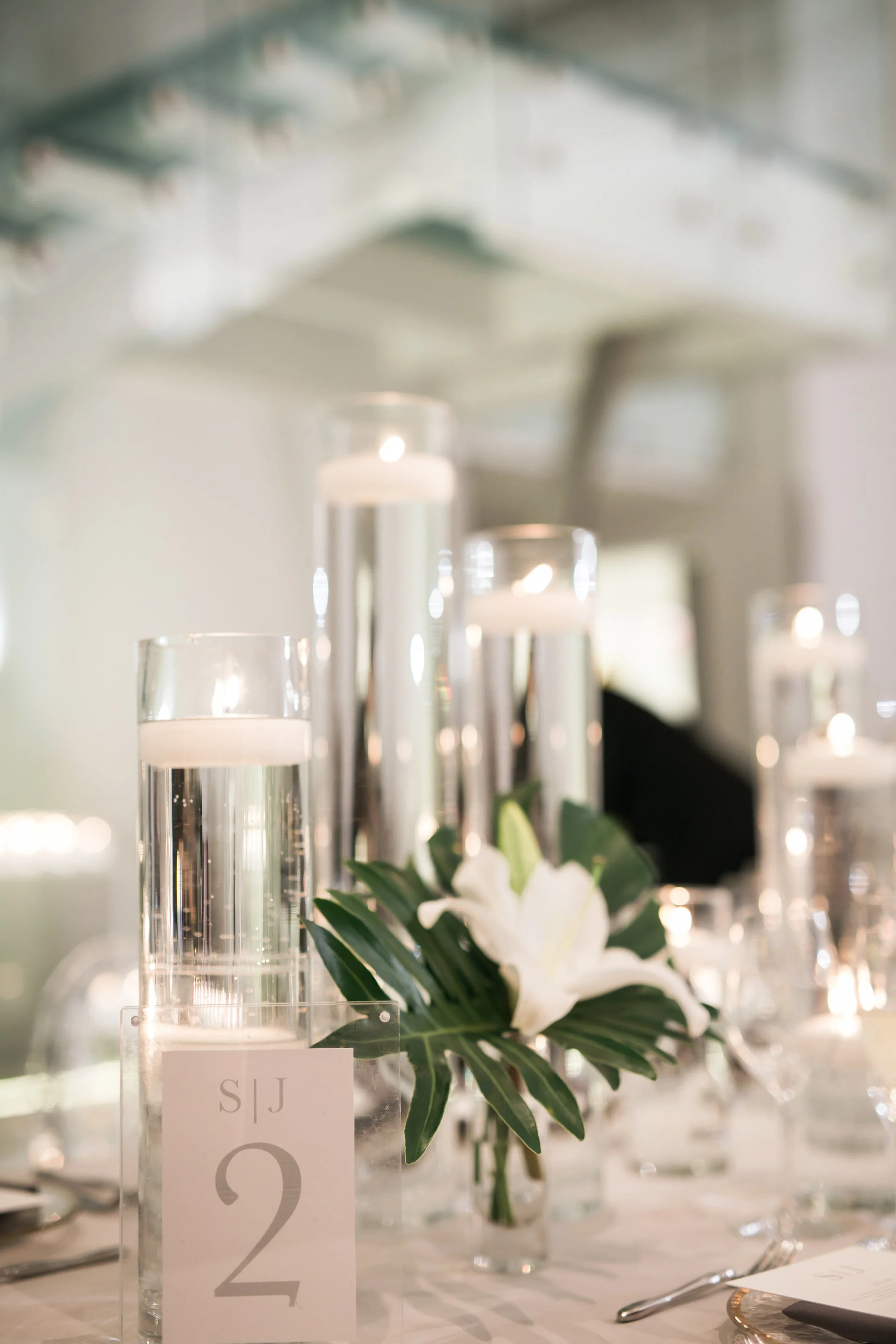 wedding reception flower centerpieces champagne glass Chicago wedding photographer 