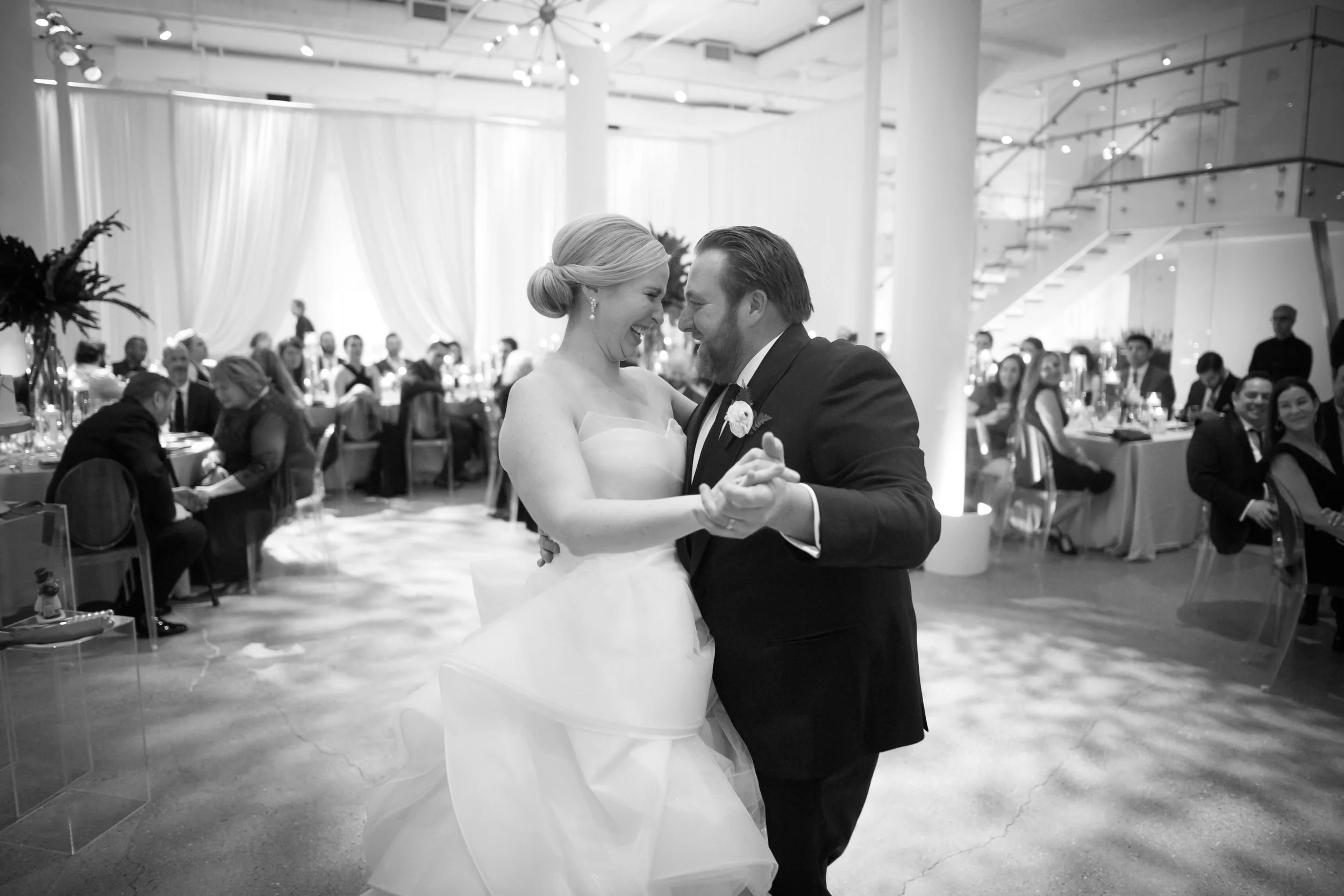 bride and groom first dance at reception Chicago wedding photographer 