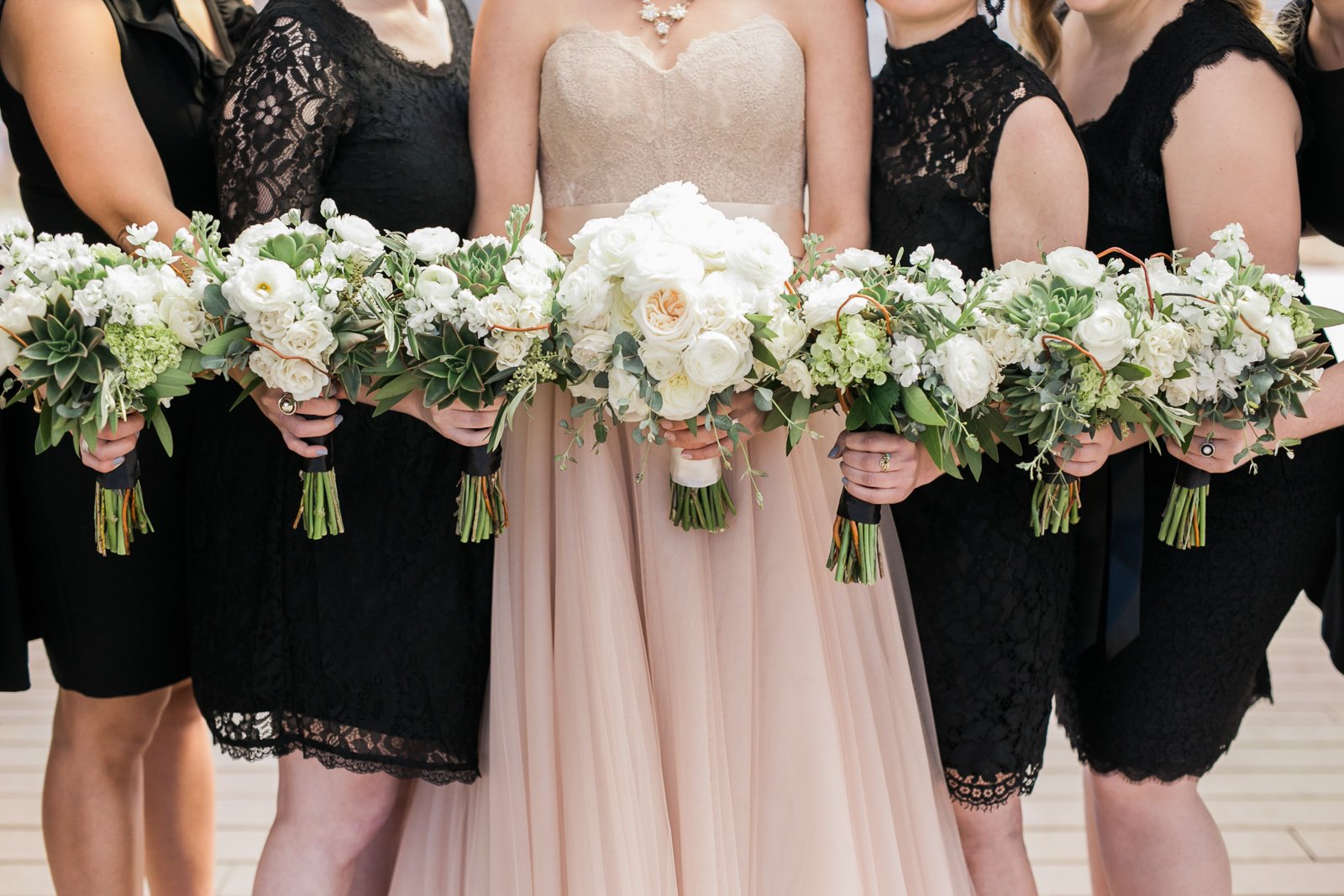 bride with bridesmaids portrait in chicago lincoln park pond wedding photography near me