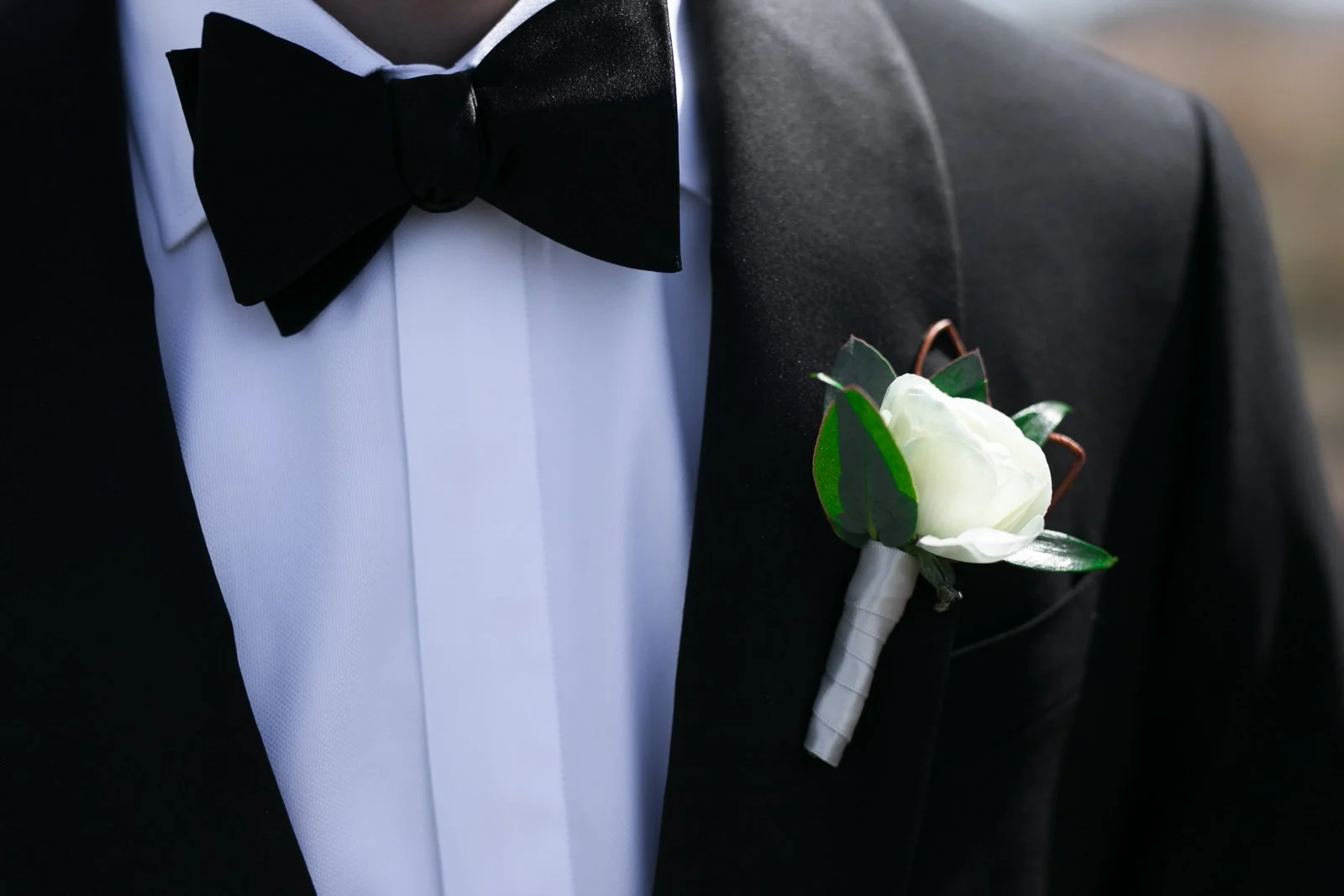 groom tux with flower corsage chicago lincoln park pond wedding photography near me 