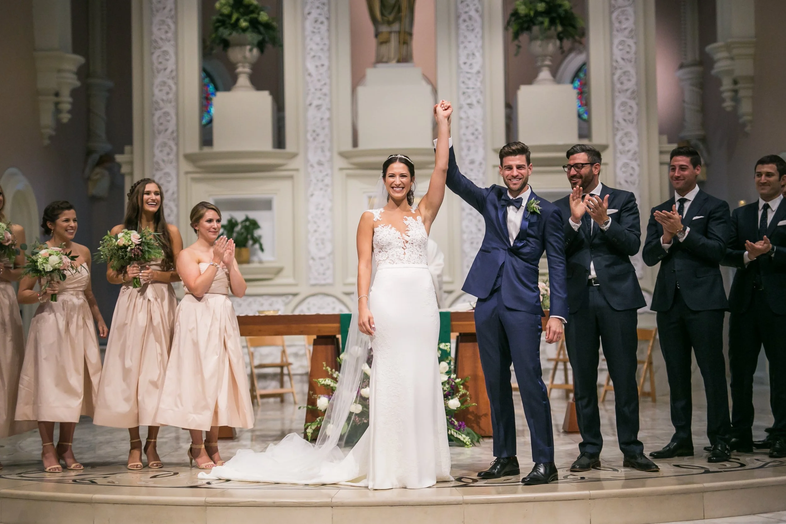 bride and groom first kiss at ceremony Chicago wedding photographer near me