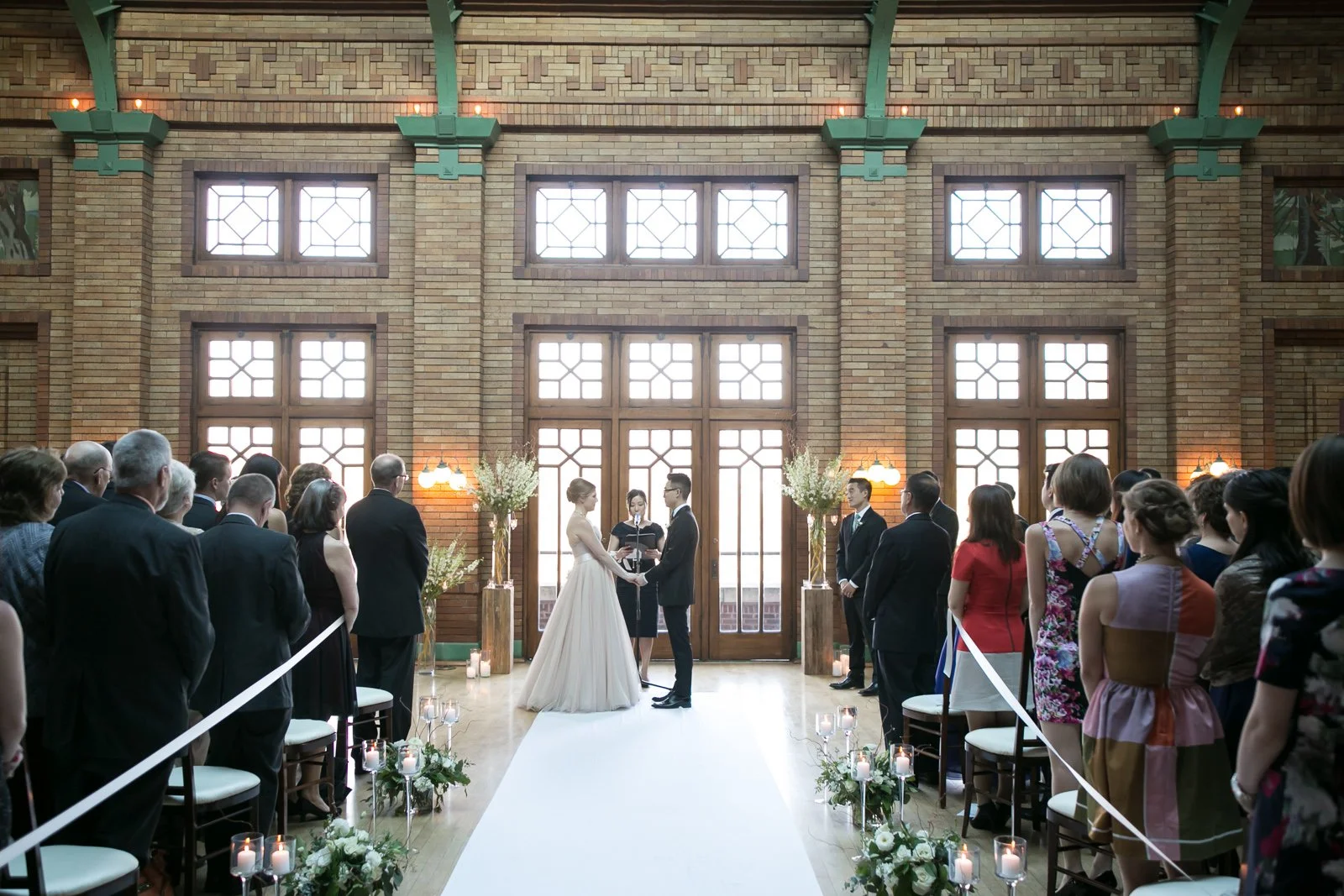 wedding bride and groom ceremony looking down aisle chicago wedding photography