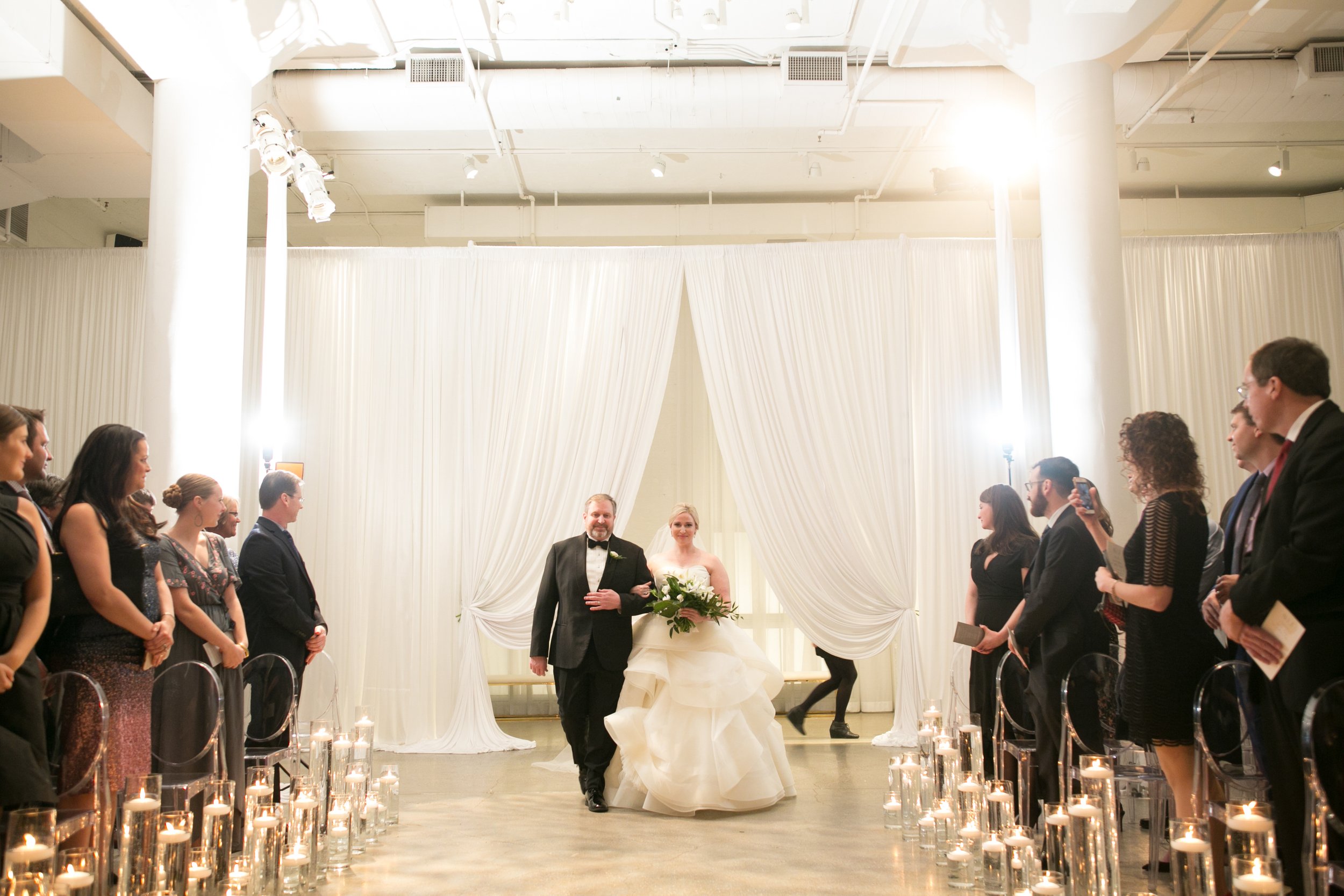 bride walking down aisle with father ceremony Venue six10 Chicago wedding photographer near me 