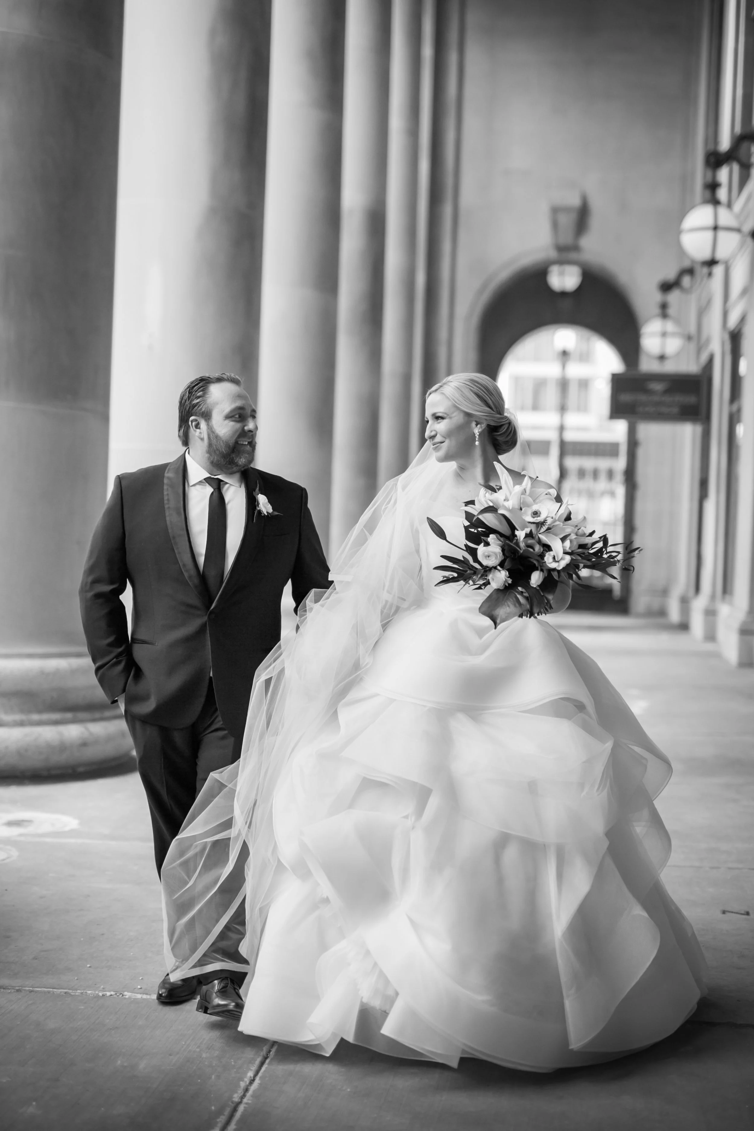 bride with groom Chicago downtown Union station wedding photography packages
