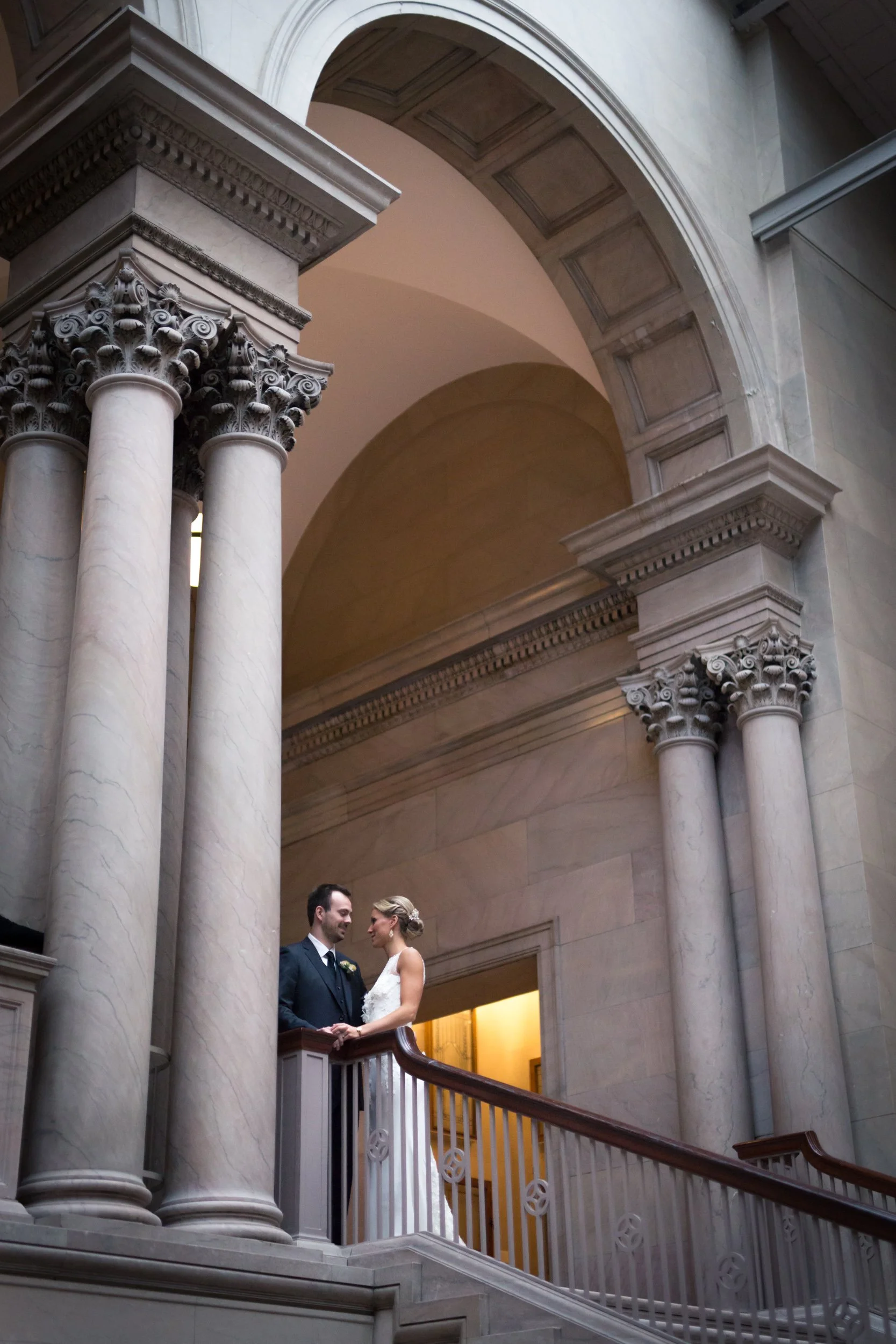 bride and groom at the Chicago Art Institute on stairs Chicago wedding photography