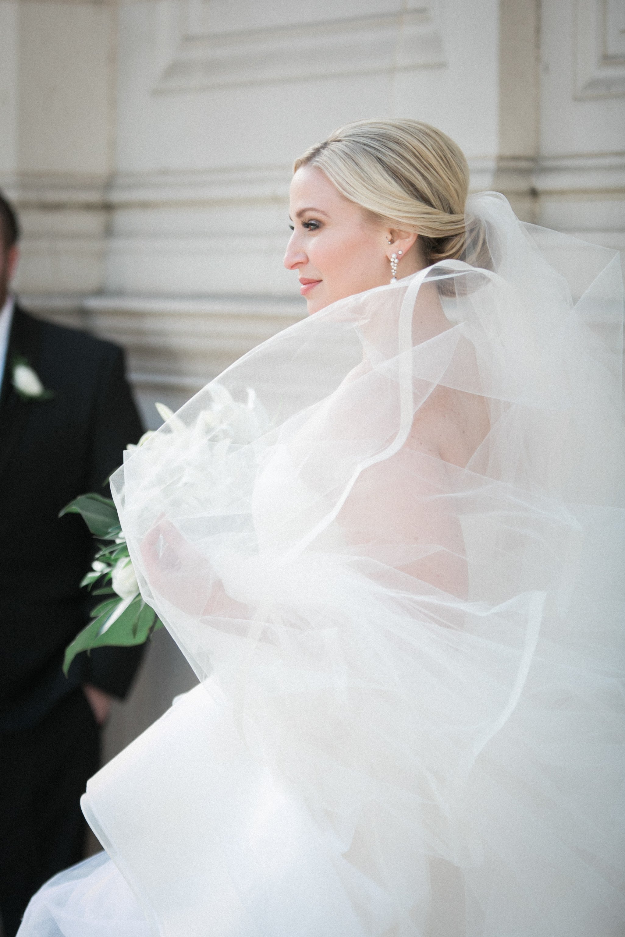bride with groom Chicago downtown Wrigley Building wedding photography packages