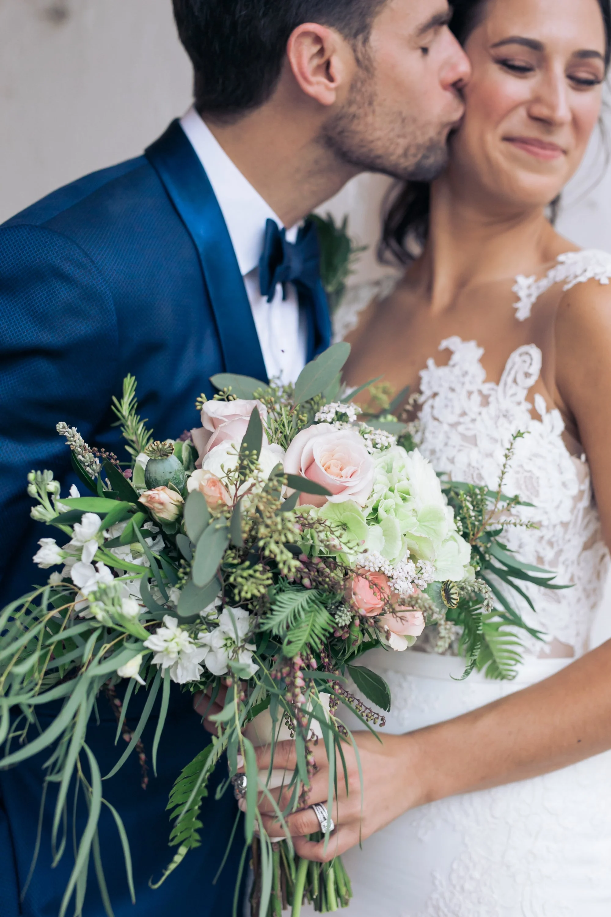 bride and groom kiss portrait Chicago wedding photographer near me