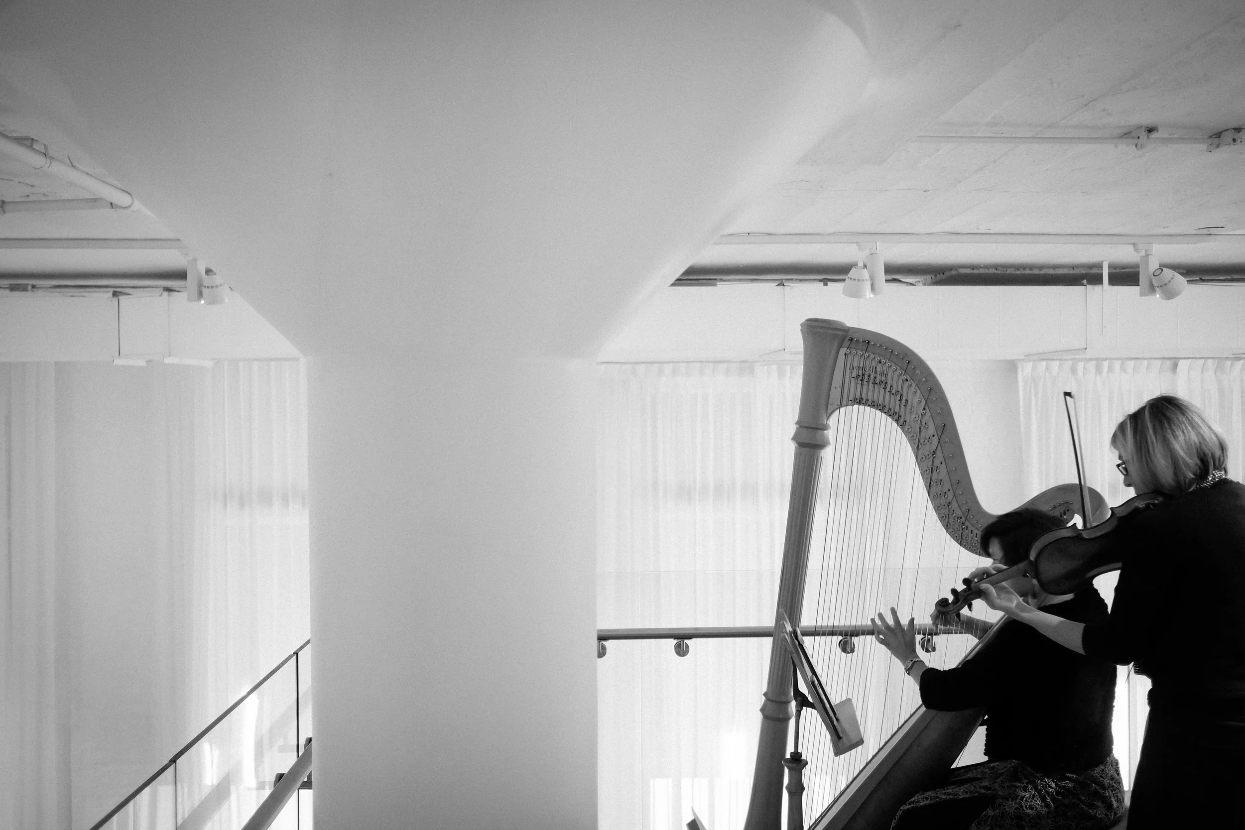 wedding reception with harp Venue six10 chicago wedding photographer near me 