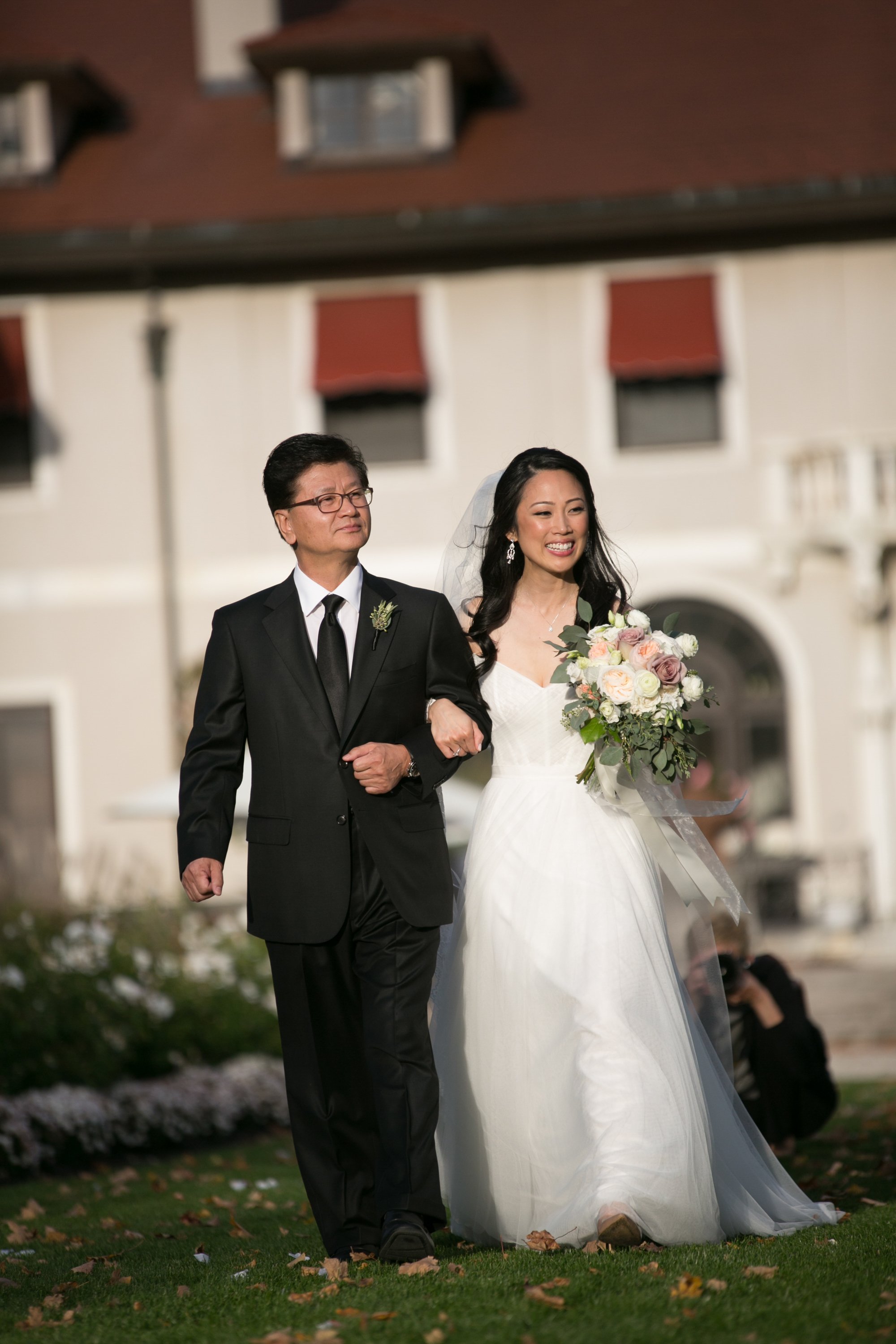 bride walking down the aisle with father wedding photographer for wedding