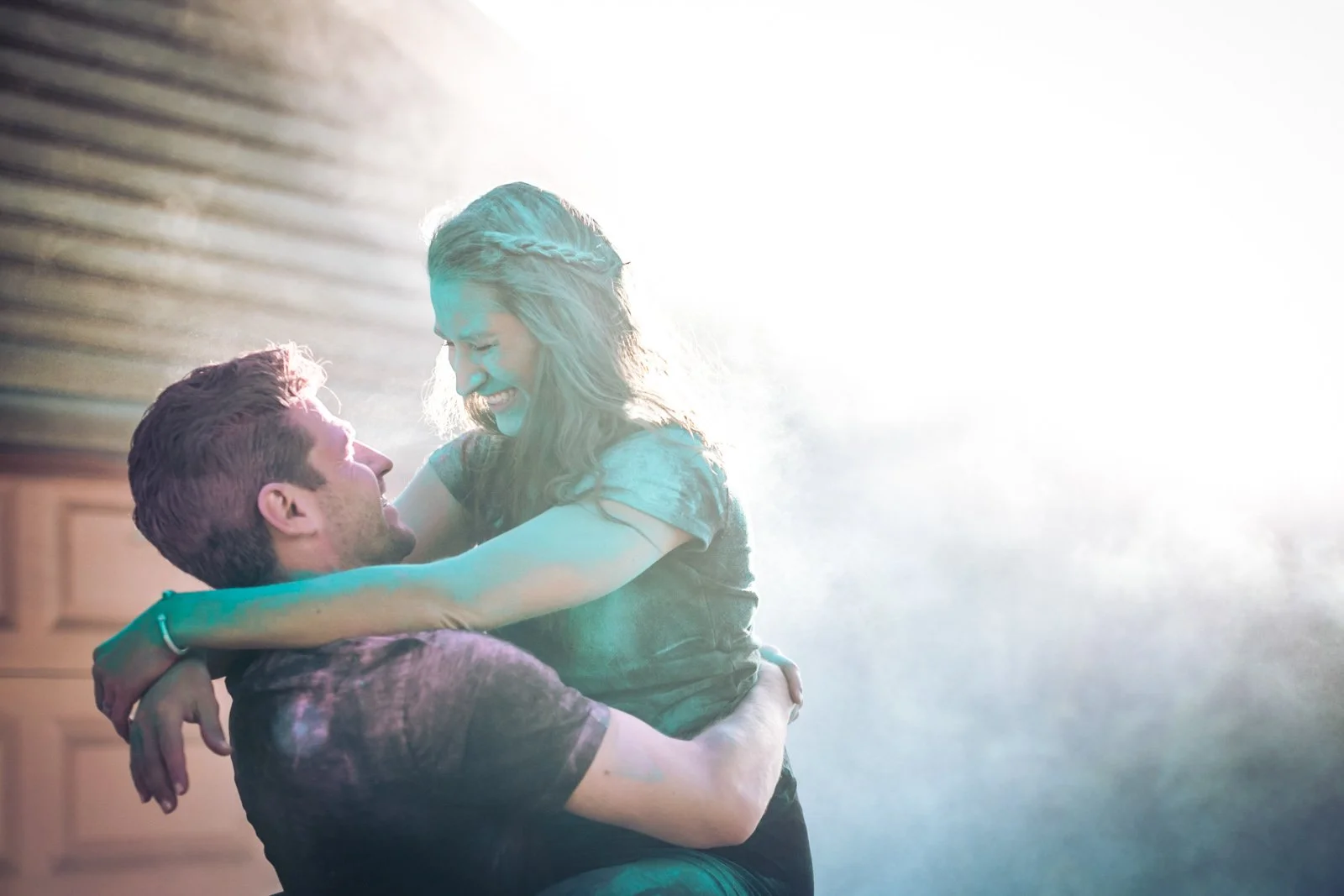 holi powder engagement photo session under el track Chicago wedding photography