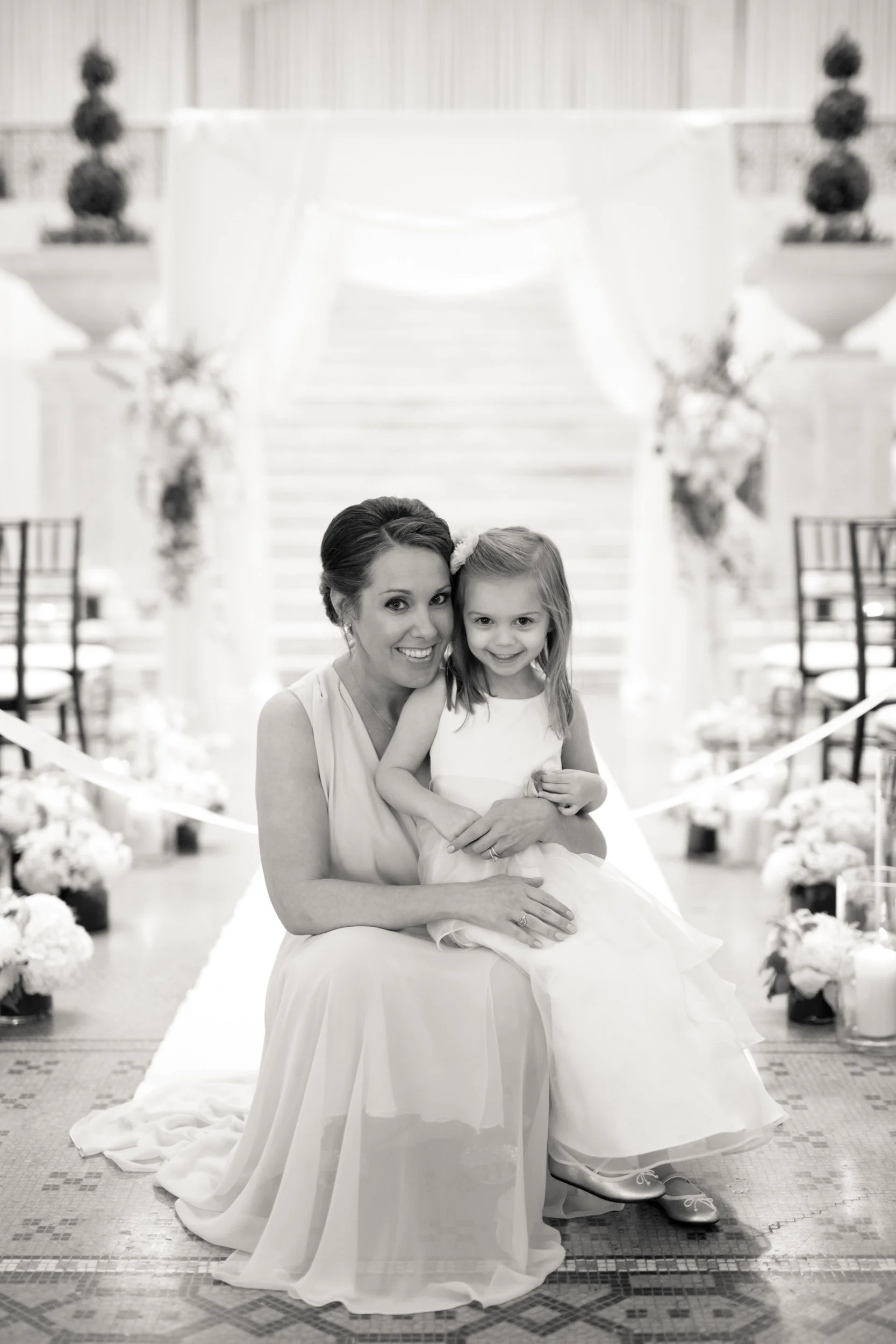 cute flower girl with mom at ceremony site Rookery Chicago wedding photography near me