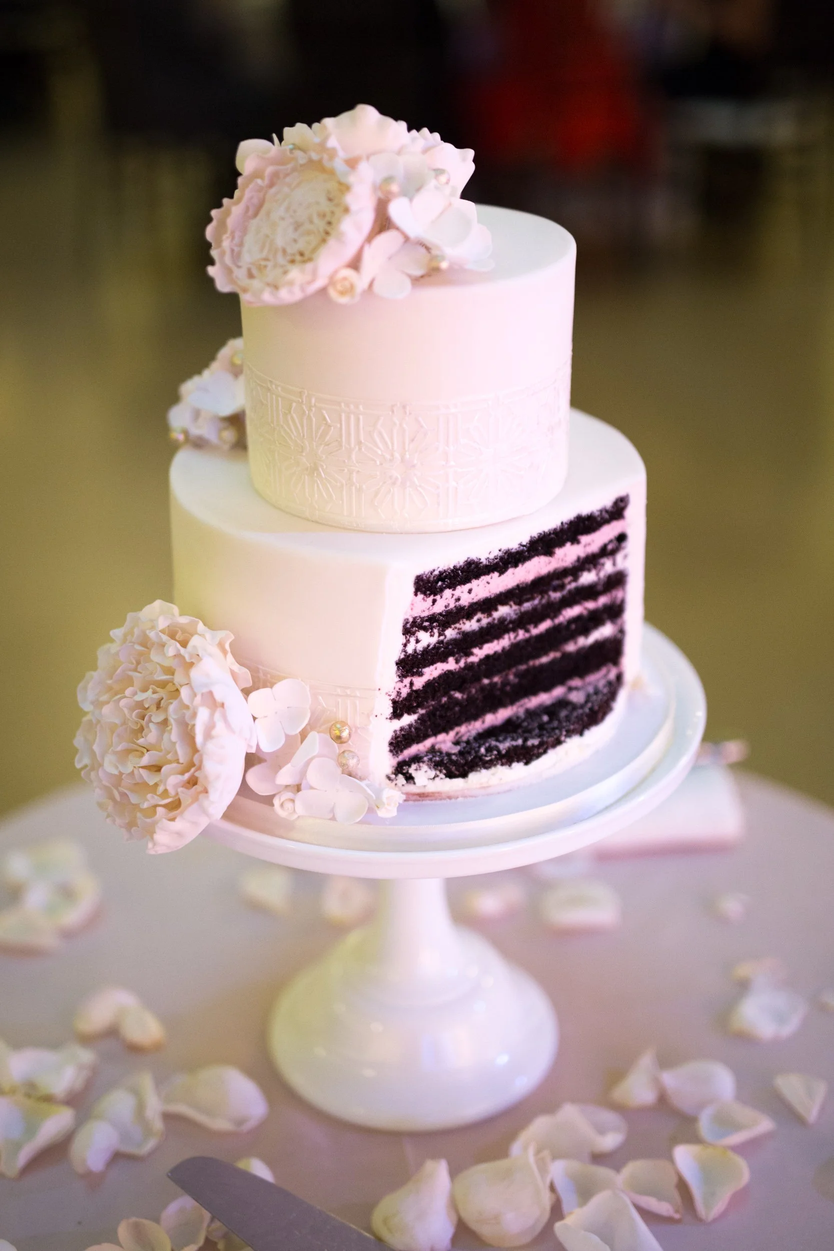 wedding cake cut funny Wedding reception Chicago wedding photographers and videographers near me 