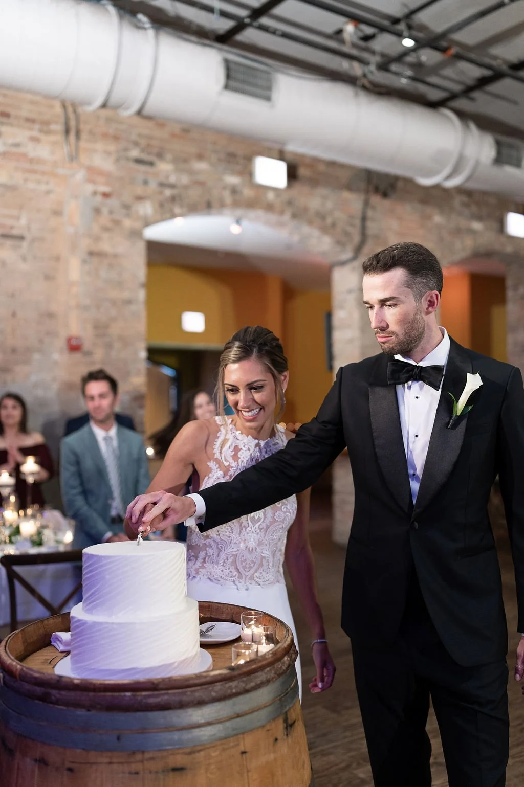 Chicago City Winery reception cake cutting candid wedding photography
