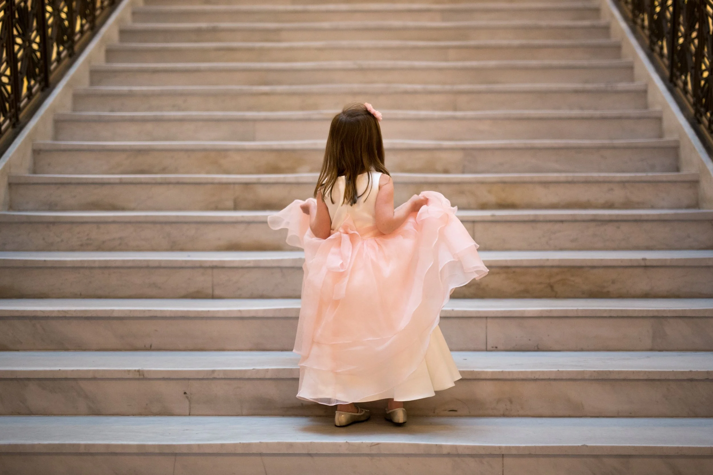 cute flower girl with mom at ceremony site Rookery Chicago wedding photography near me