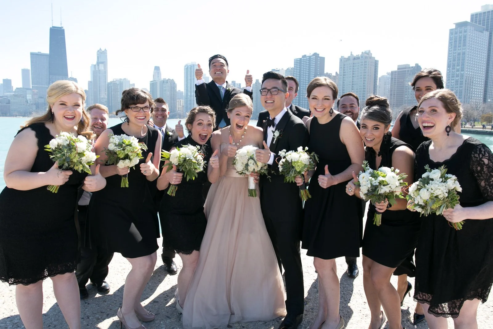 bridal party photo smiling north avenue beach lake michigan wedding photography near me 