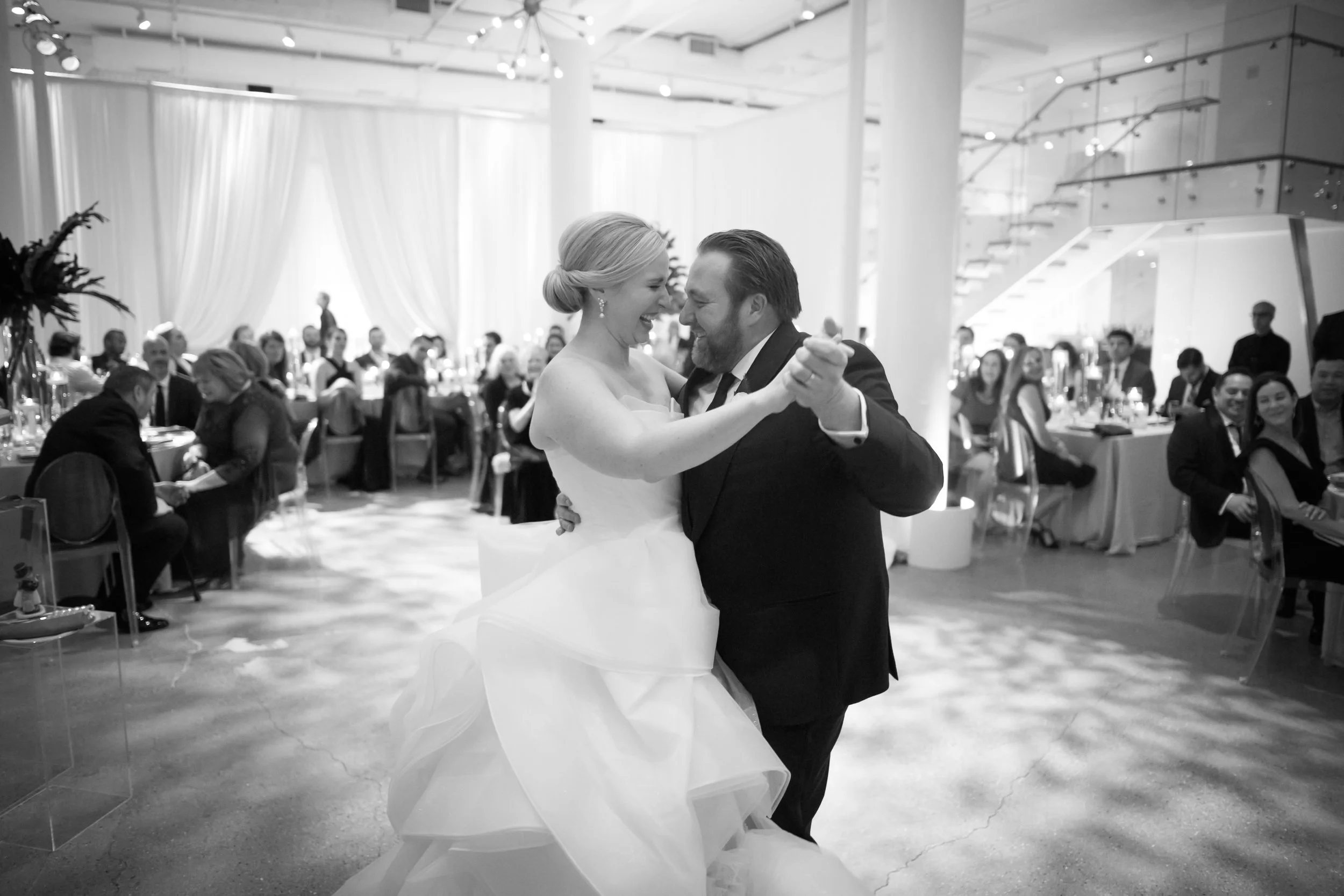 bride and groom first dance at reception Chicago wedding photographer 
