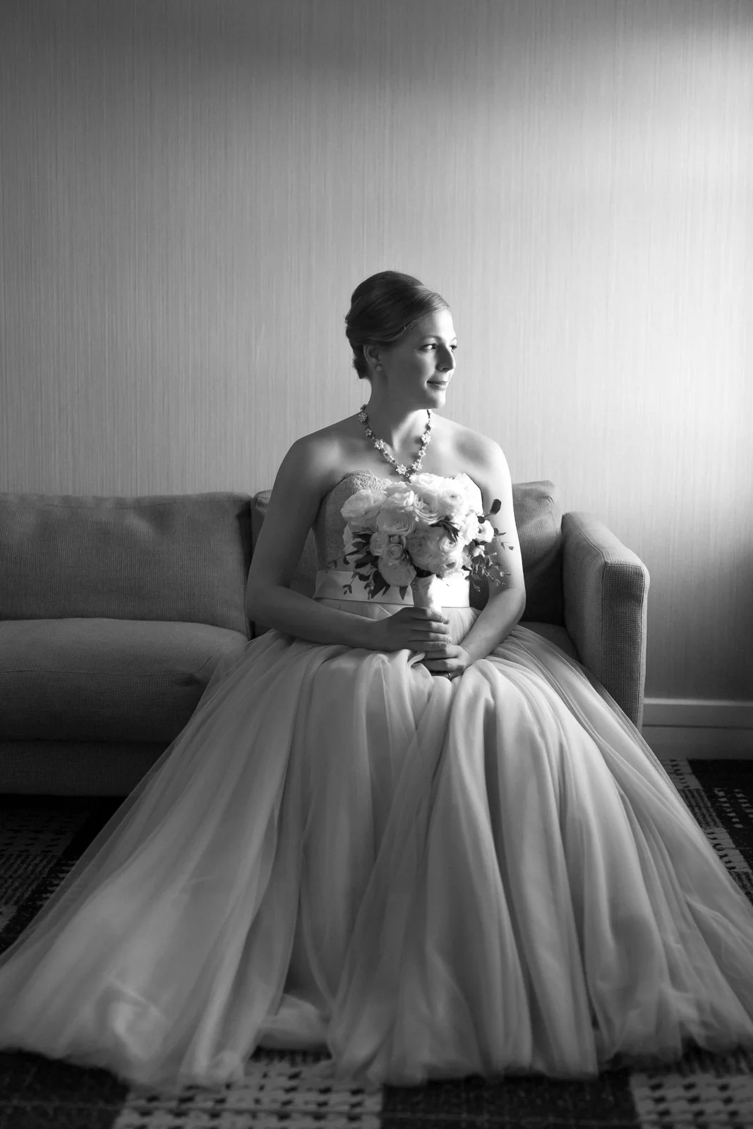 bride with wedding necklace with diamonds flower bouquet wedding photography