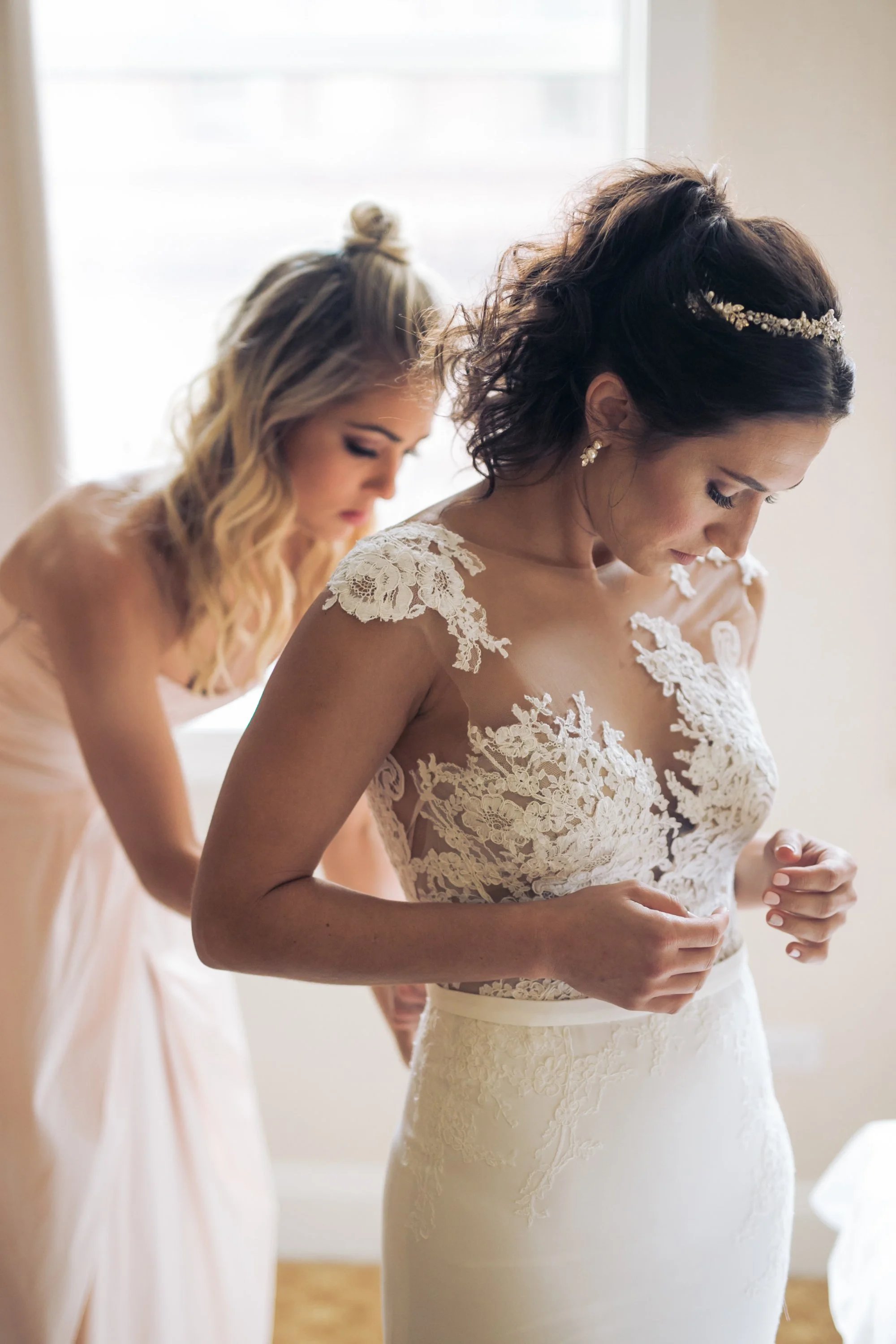 bride dress getting dressed wedding photographer near me 