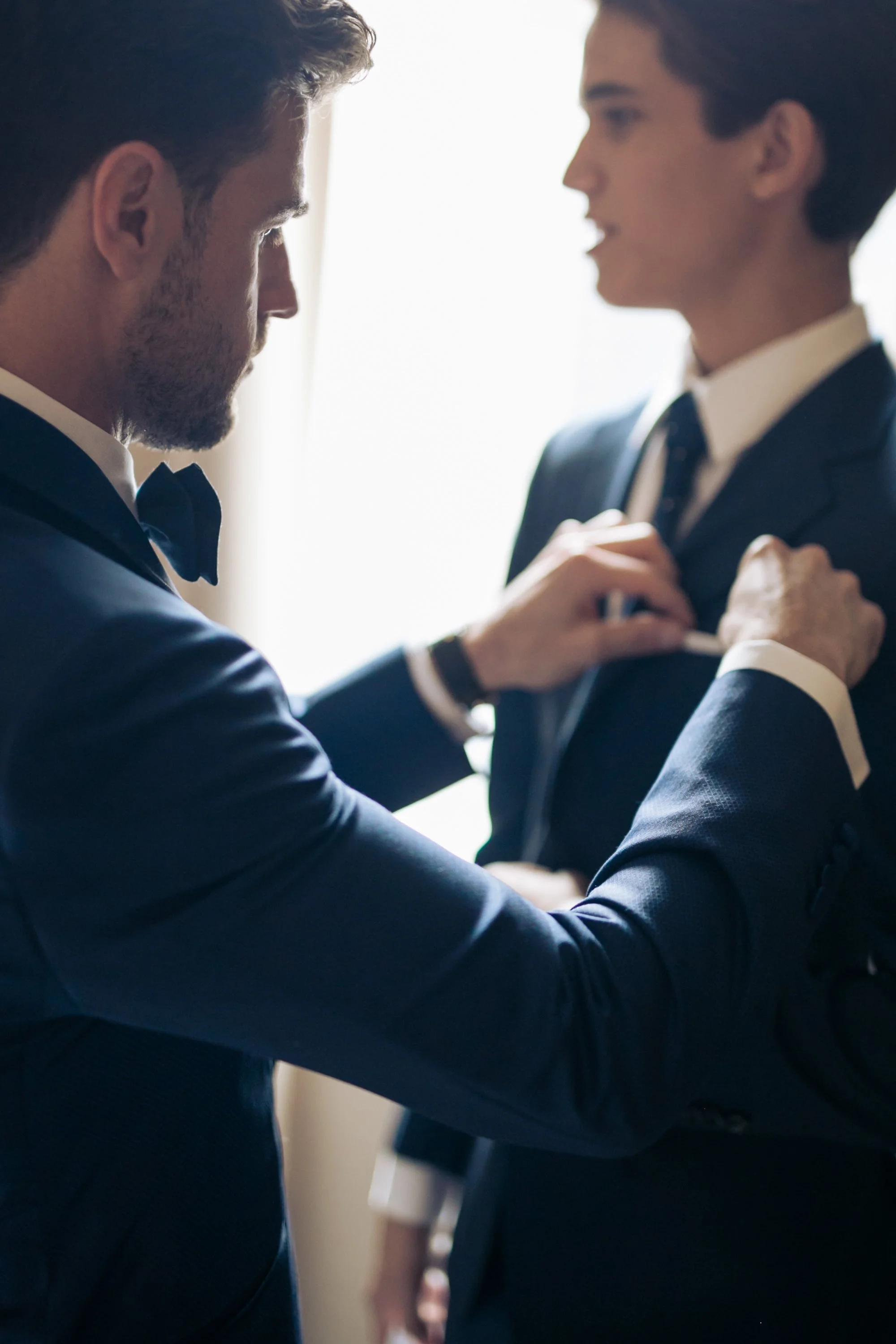 groom with best man tuxes wedding photographer near me 