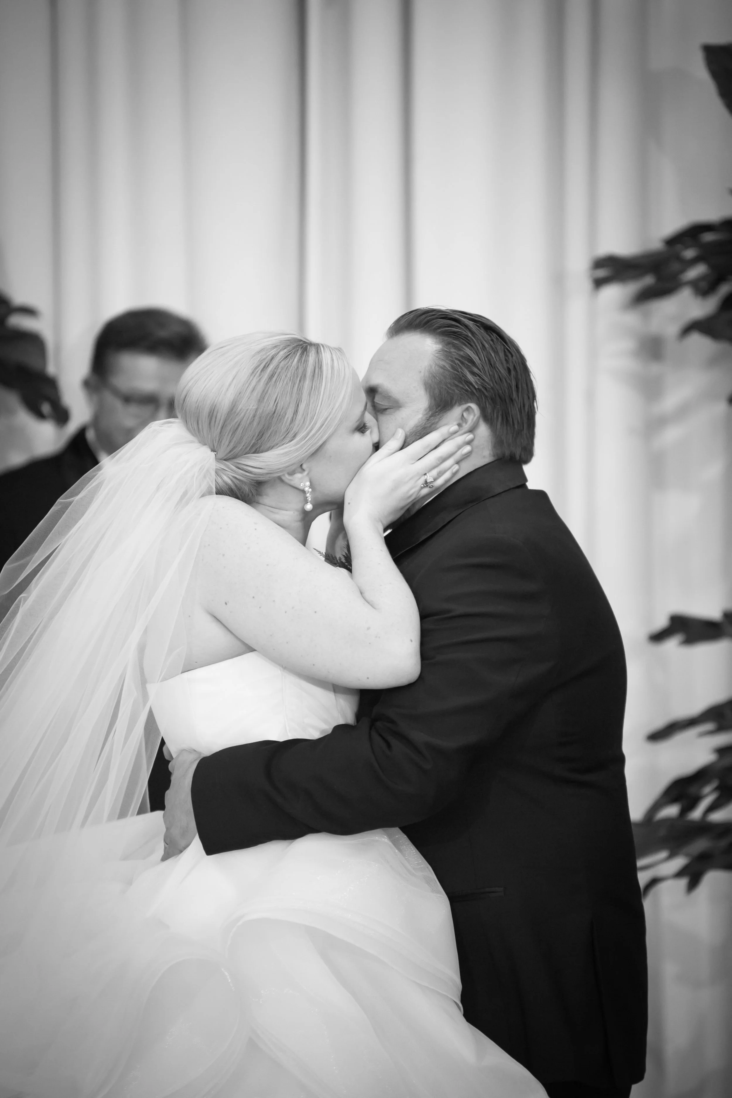 bride and groom get married kiss ceremony Venue six10 Chicago wedding photographer near me 