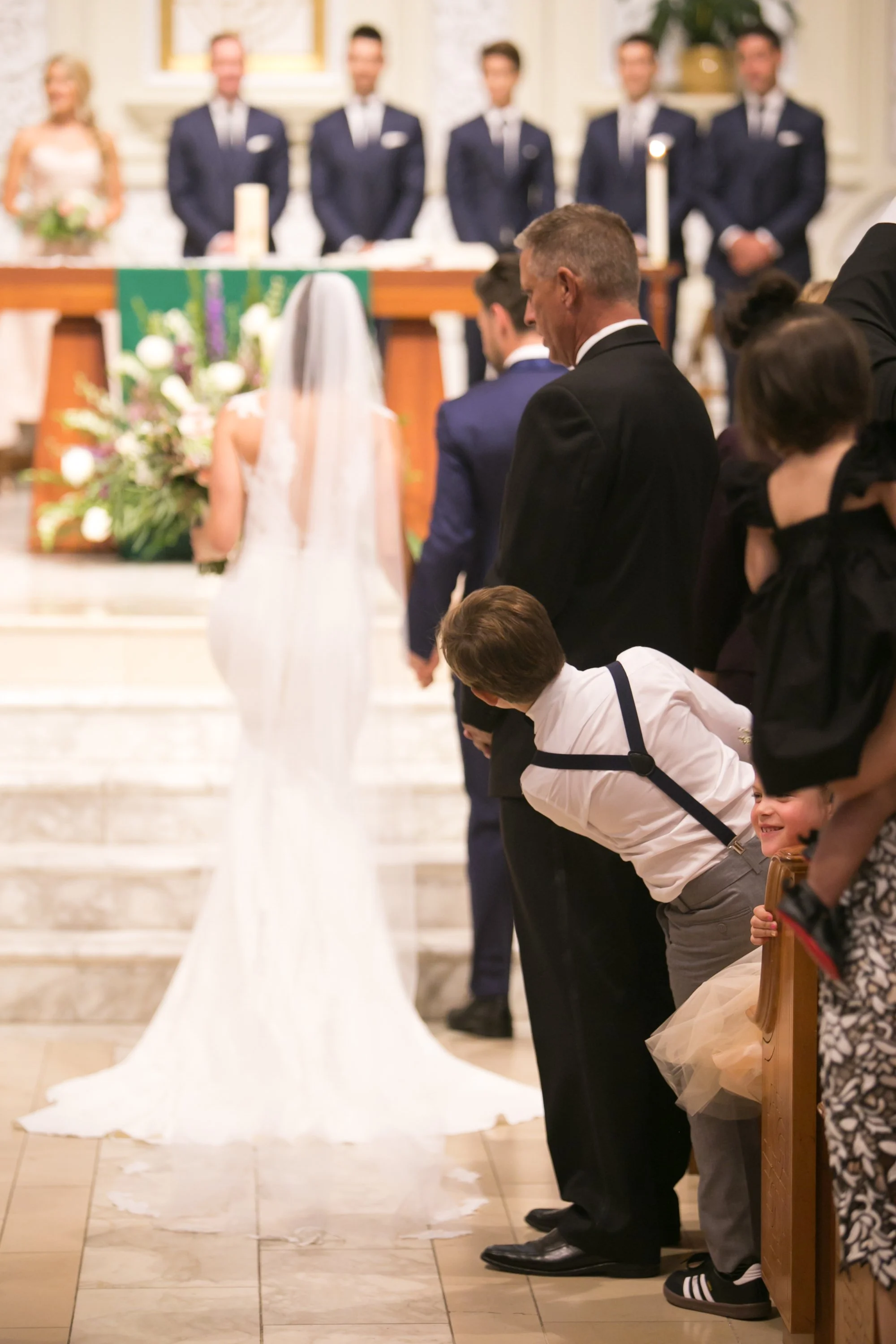 bride and groom walking down aisle Chicago wedding photographer near me