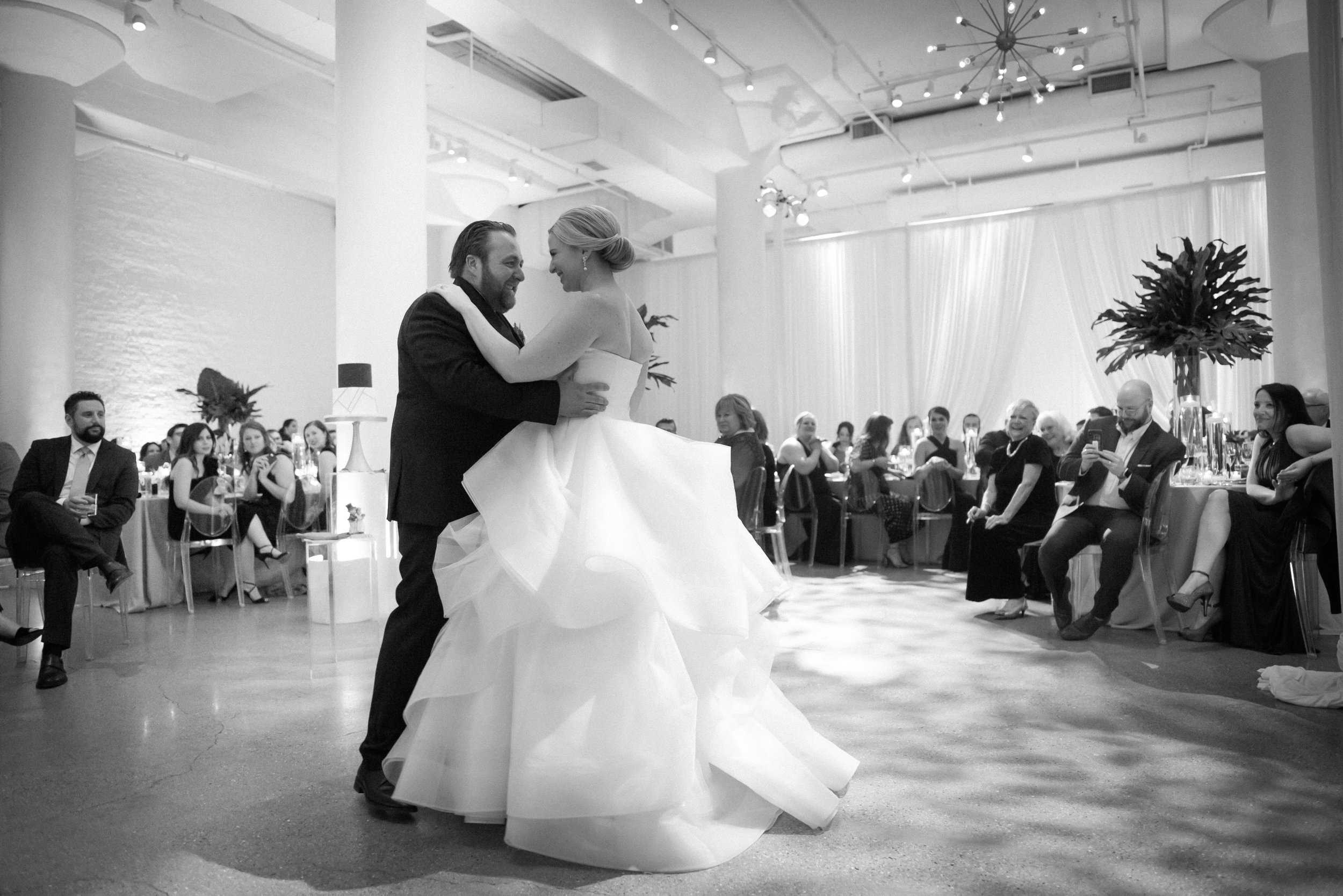 bride and groom first dance at reception Chicago wedding photographer 