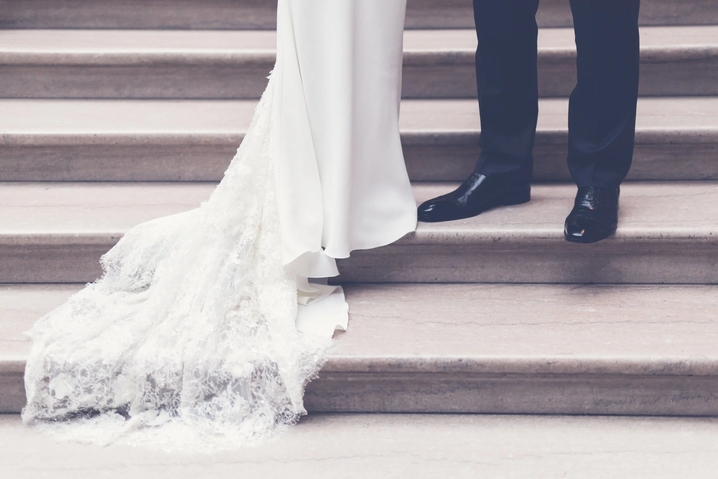 bride and groom at the Chicago Art Institute on stairs Chicago wedding photography