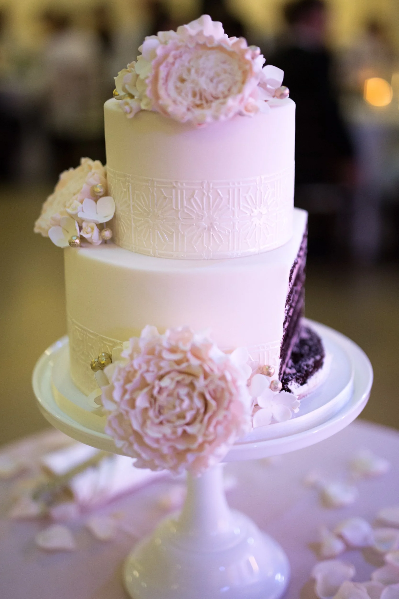 wedding cake cut funny Wedding reception Chicago wedding photographers and videographers near me 