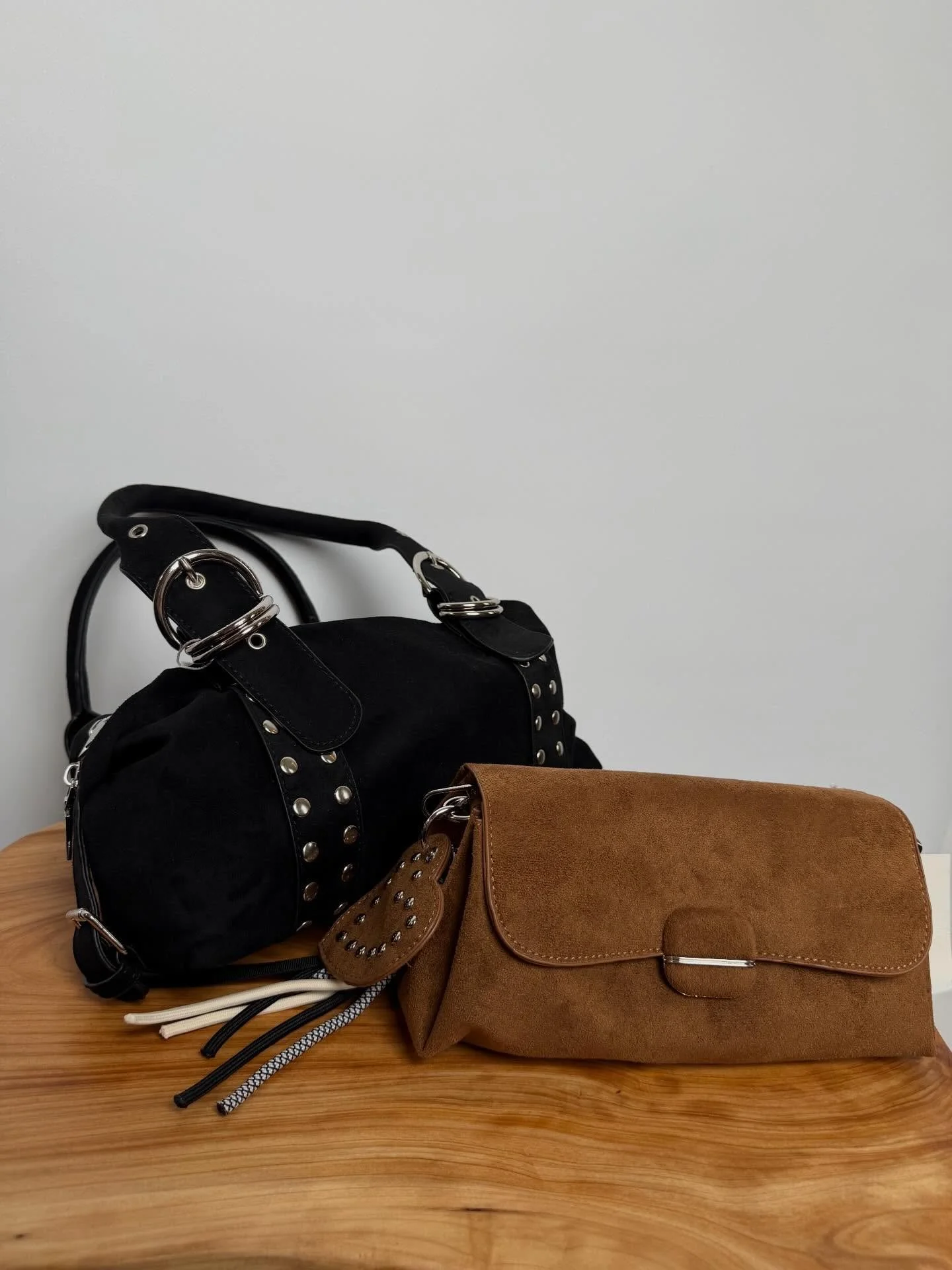 Current bag crushes: activated 👜✨
From everyday black to the perfect warm suede moment, these are the finishing touch your outfit&rsquo;s been waiting for.

Black purse retails for $40
Suede purse retails for $32