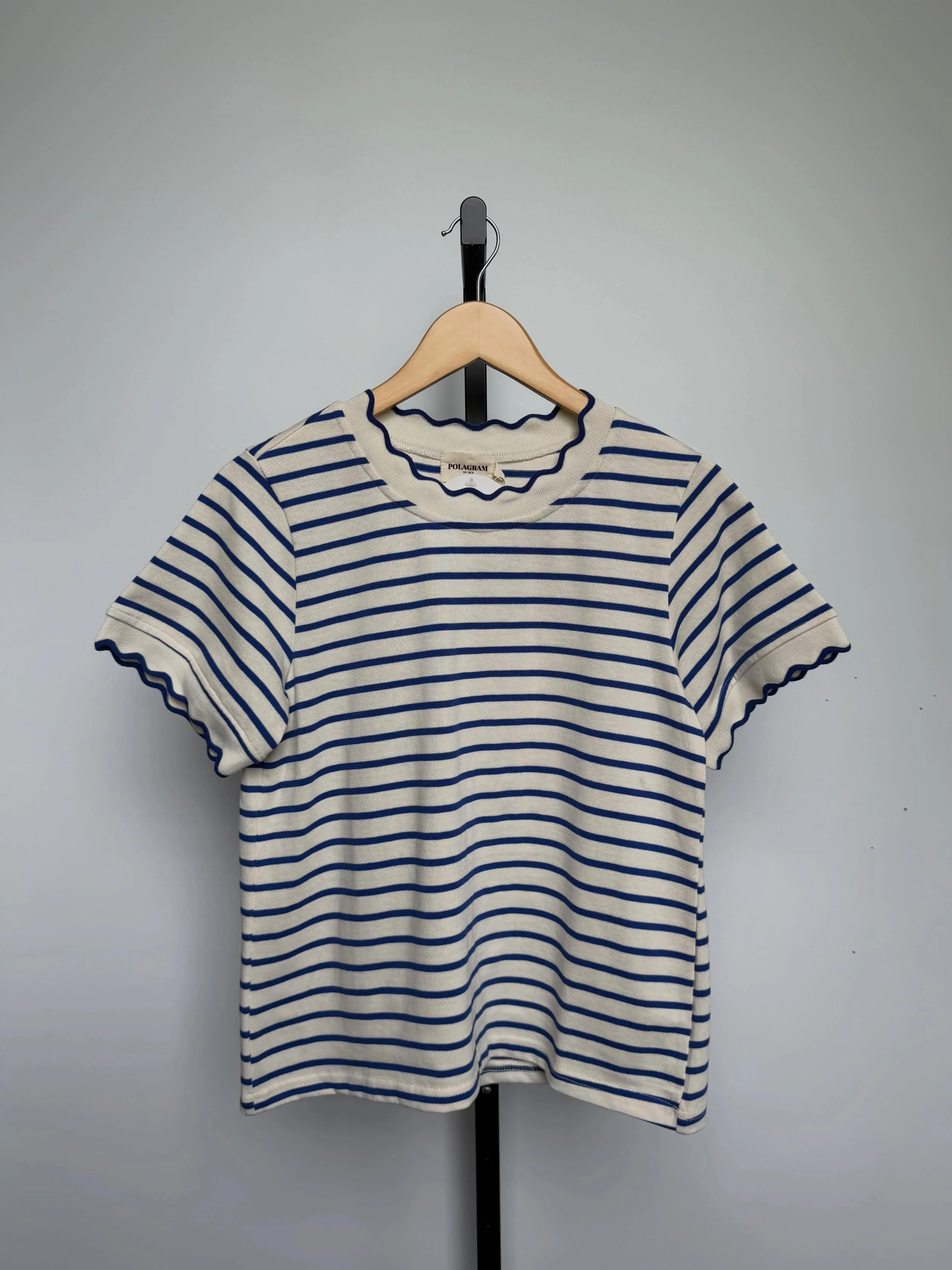 Simple, cute, and a little coastal 🐚 This striped tee is an easy closet staple with the cutest scalloped edges! Pair it with denim or your fave leggings and you&rsquo;re good to go!

Available in sizes S-XL / Retails for $40 ✨