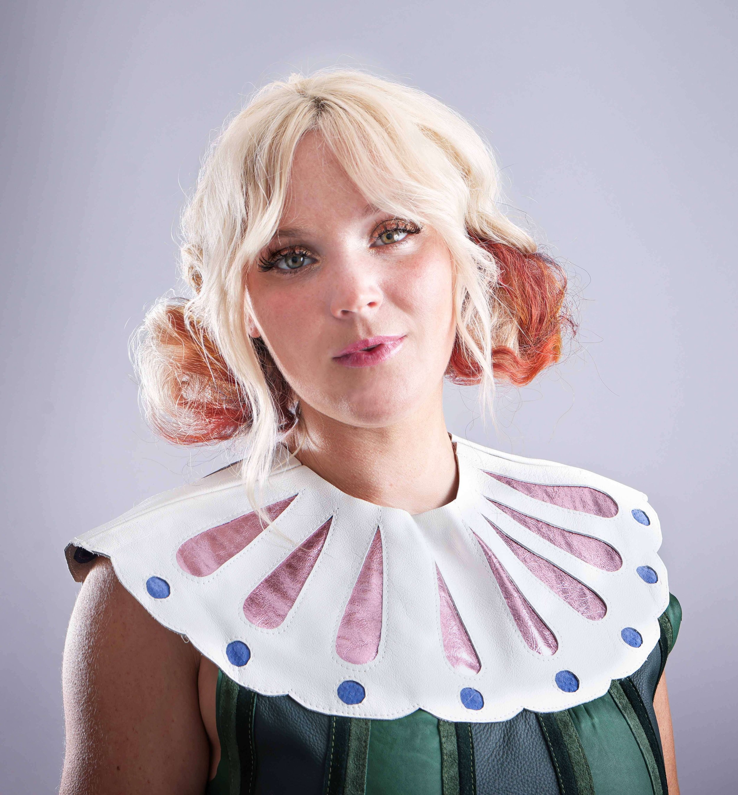 Woman in a 60's inspired dress designed by local Fayetteville AR designer 