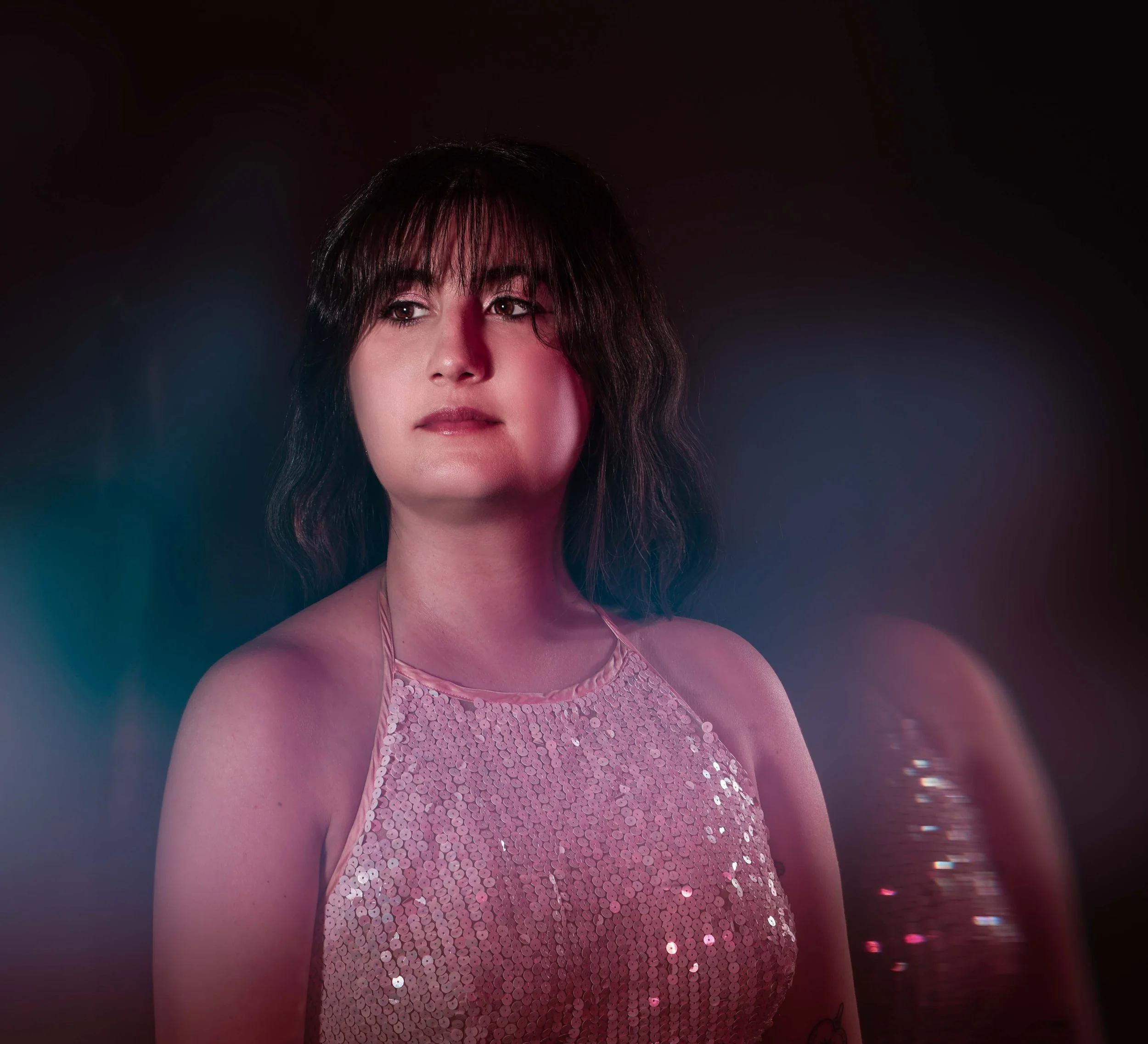 Colorful motion blur image of a woman during a portrait shoot 